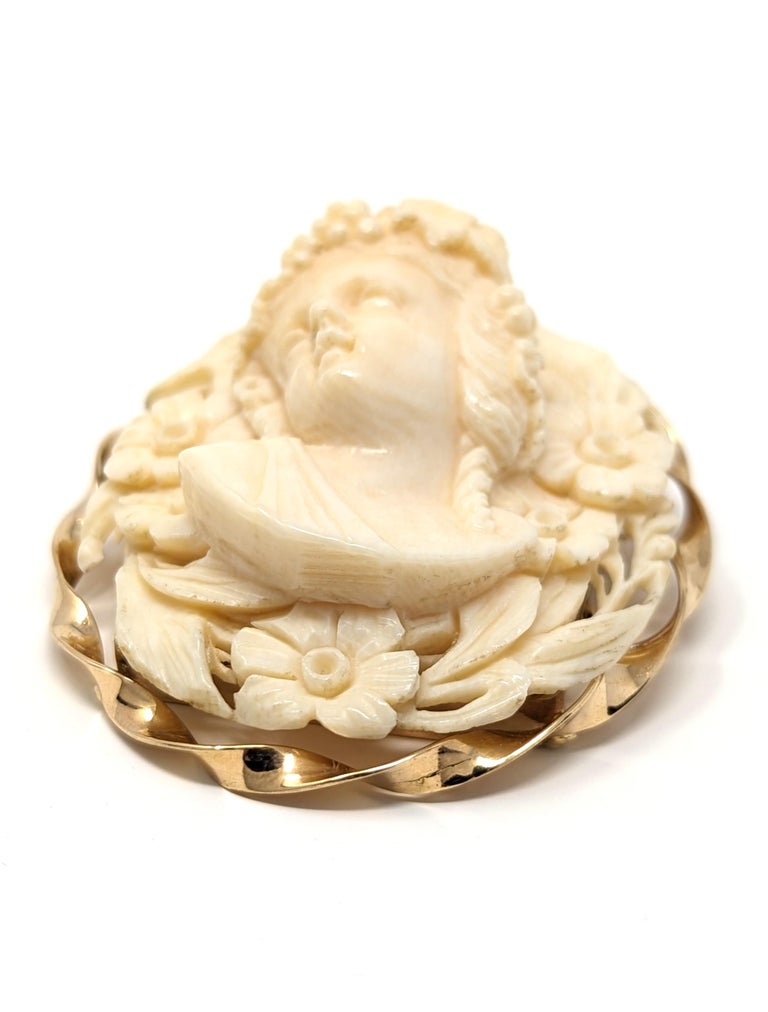 Value of antique italian cameo brooch? Elegant Cameo Brooch with solid gold rims and diamonds with hand created ivory display picture 1