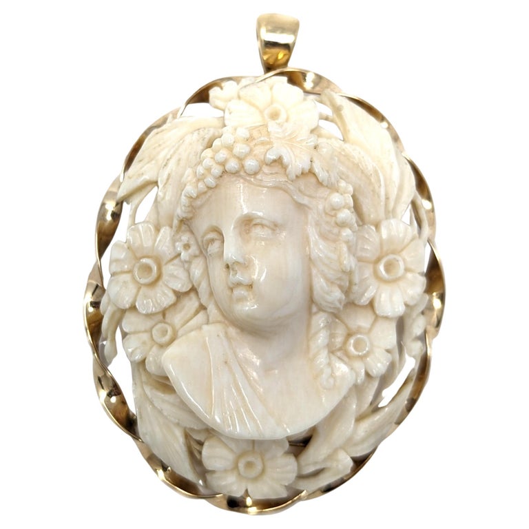 Value of antique italian cameo brooch? Elegant Cameo Brooch with solid gold rims and diamonds with hand created ivory display picture 1
