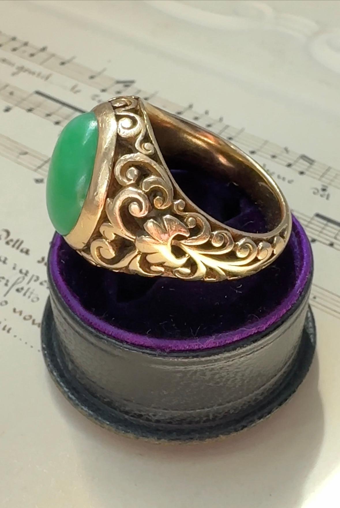 Sculptural and solid, this gorgeous antique ring has been expertly hand-fabricated in 14k rose gold. The scrollwork is entirely hand chased and beautifully frames the apple green jade cabochon. Size 7.5.

 

Jade: 10.17 x 14.10mm, certified natural