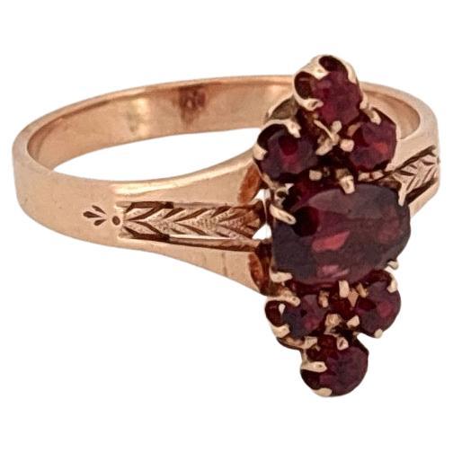 Taglio rotondo Anello antico in oro rosa 14 carati da 1,13 carati con pietra di granato rosso taglio tondo e ovale in vendita