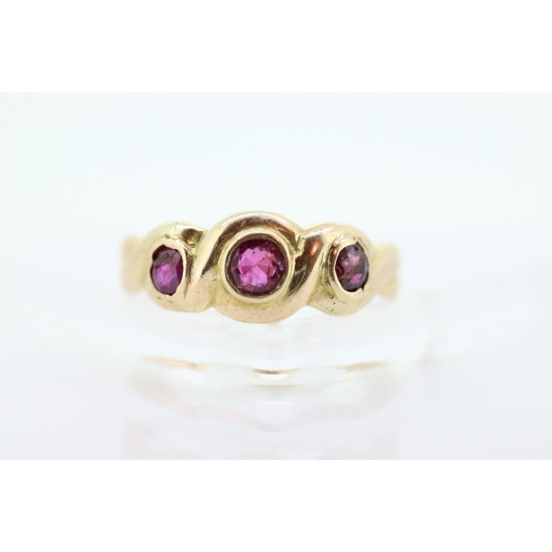 Antique 14k Ruby Ring. Bezel set Triple Ruby ring. 14k yellow gold and Trio In Good Condition In Port Charlotte, FL