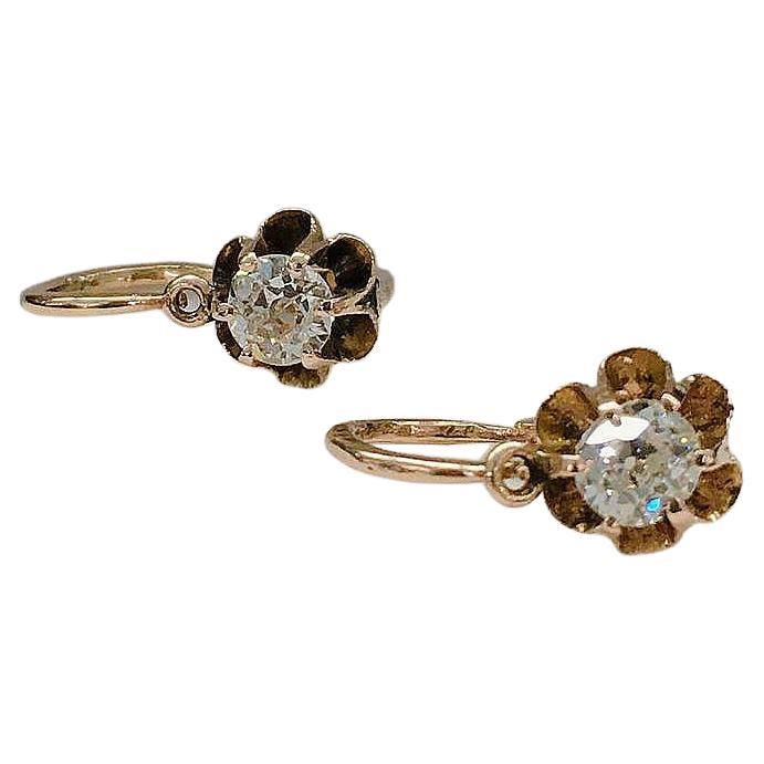 Antique russian old mine diamond 14k gold earrings in solitair style with an estimate diamond weight of 0.60 carats diamond diameter 5.58mm each stone H colour white vs clearity earrings was made in moscow during the imperial russian era 1907/1910.c