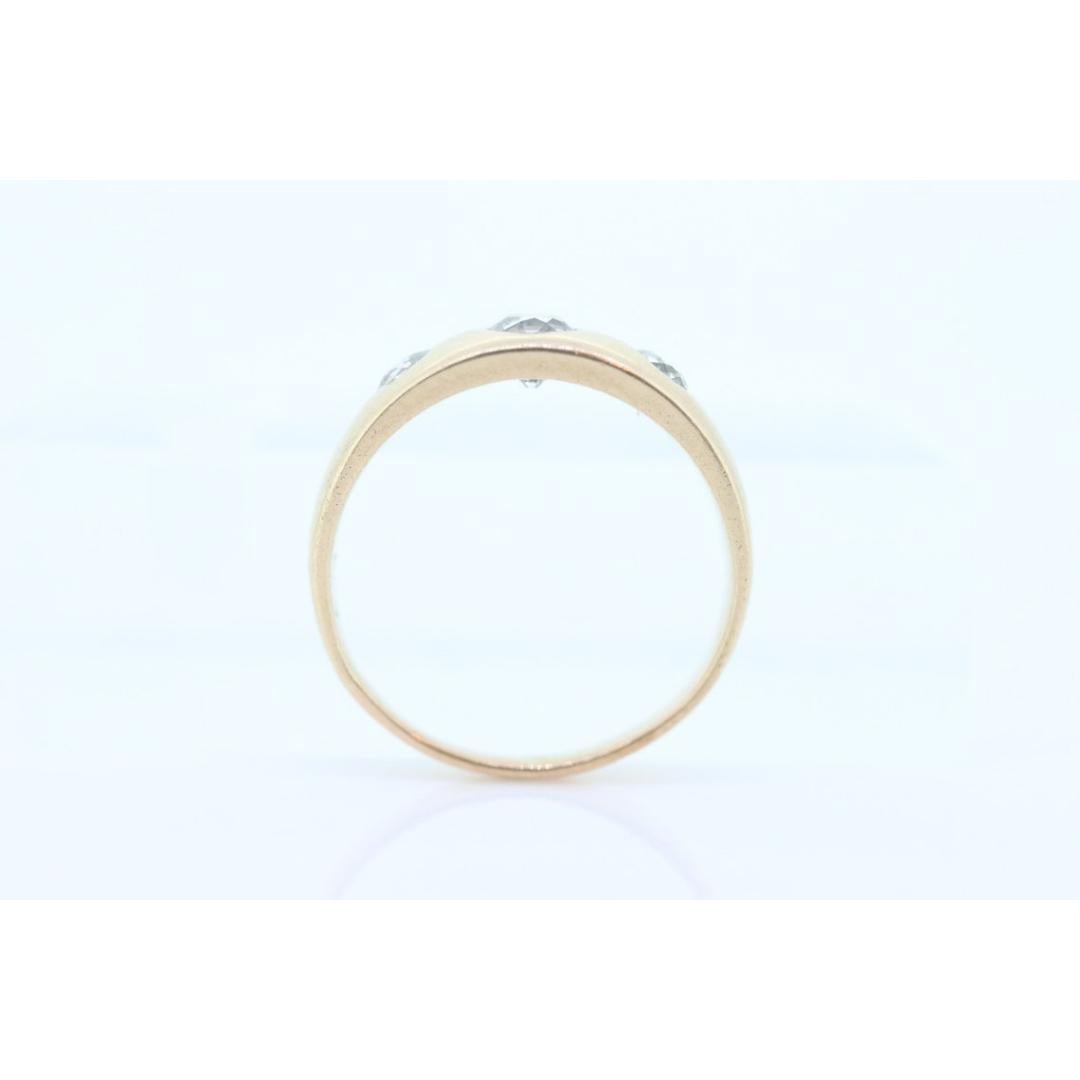 Vintage from the 1930s
Size: 8 US
Materials: Gold
Gemstone: Diamond
Gem Color: Colorless

Style: Minimalist

Very unique Men or Women's ring/band. Triple diamonds set into signet style ring. Will look spectacular worn on any finger.

Condition: