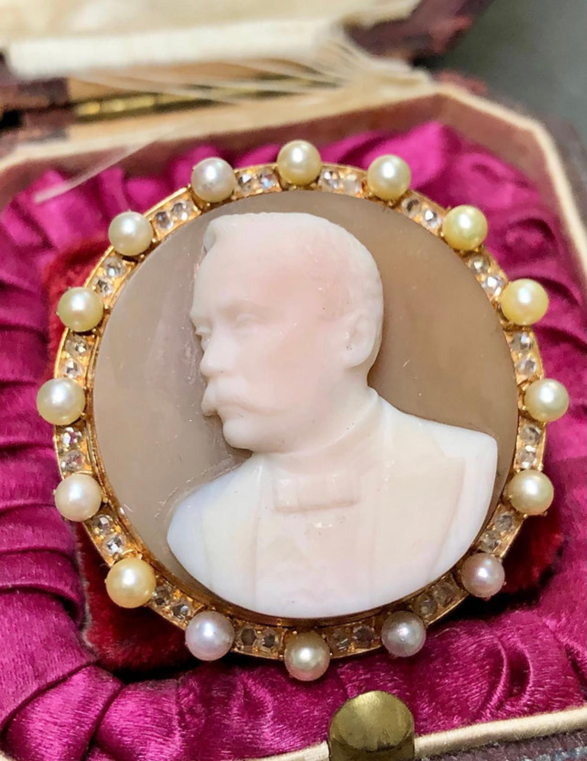 Beautifully made original Victorian high-relief carnelian hard stone cameo done in 14K surrounded by natural seed pearls and rose cut diamonds.

Dimensions
1 1/2” in diameter.

Condition
No chips to the stone and all diamonds/pearls are secure and