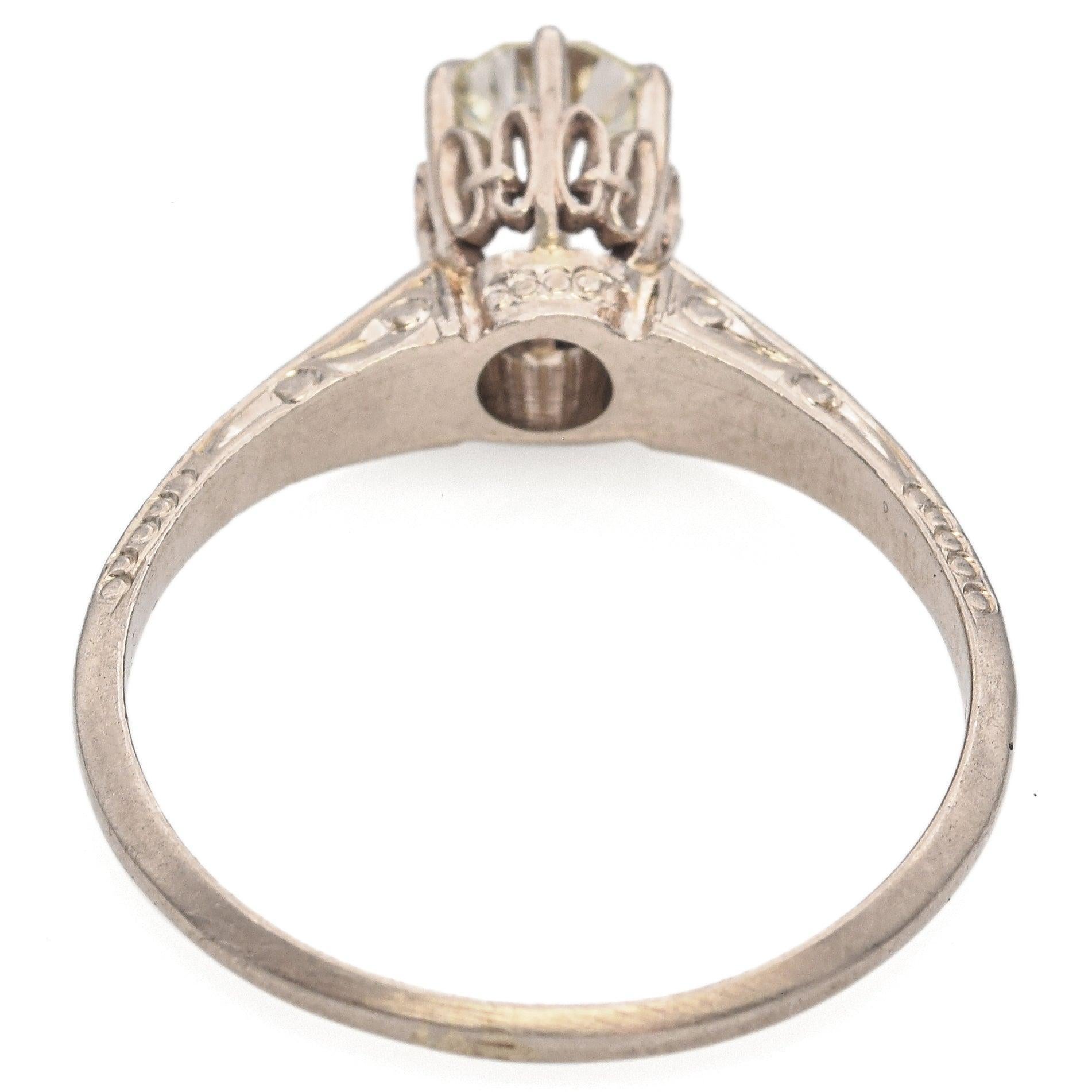Bague ancienne en or blanc 14K avec diamant de 0,67ct à haute couronne et de type 