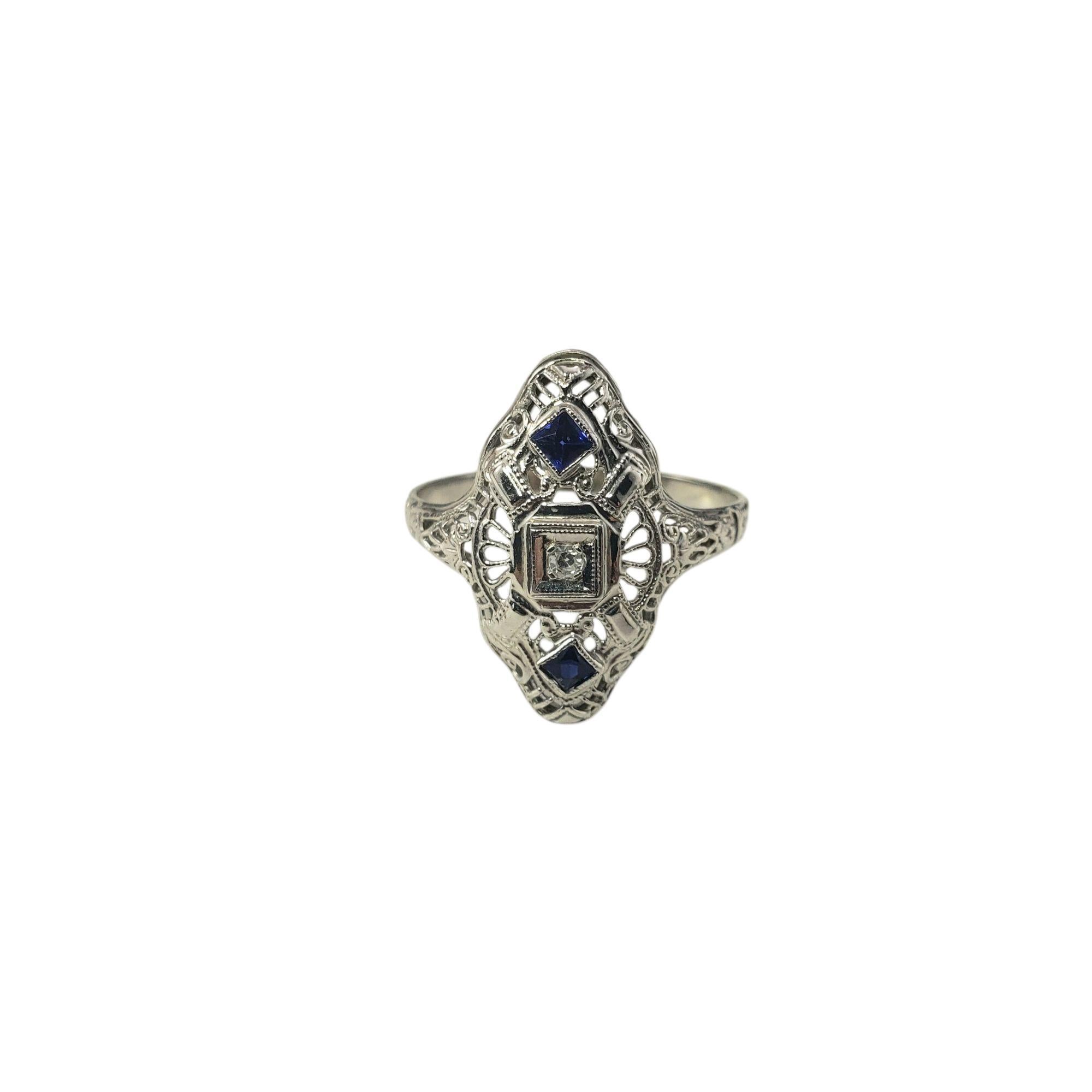 Antique 14K White Gold Filigree Diamond and Blue Stone Ring Size 8.75

This delicate antique ring features two vibrant blue faceted stones a one round single cut diamond set in intricate 14K white gold filigree.

Top of ring measures 20 mm x 15 mm.