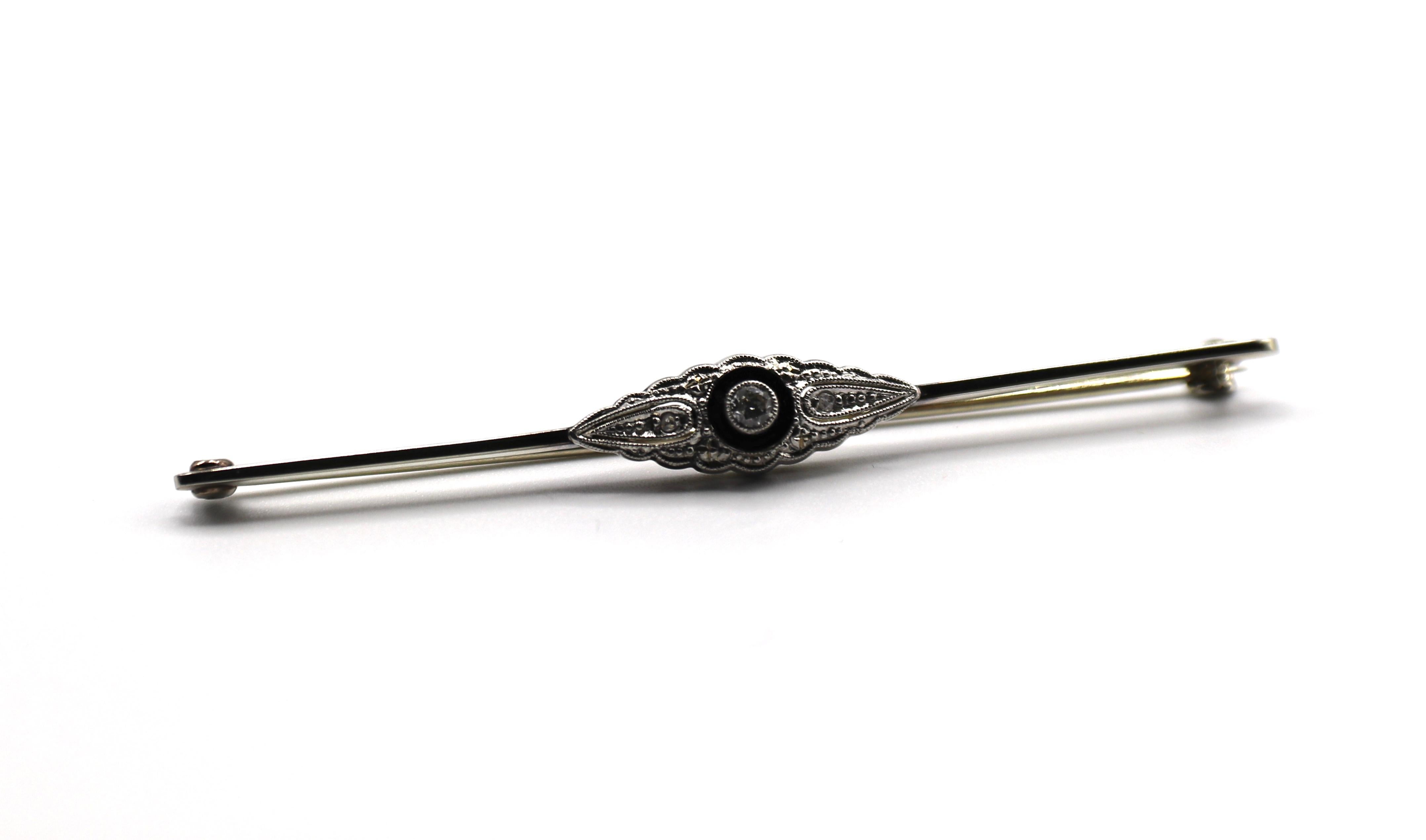 Antique 14K White Gold Mine Cut and Round Diamond Black Onyx Bar Pin Brooch

Metal: 14k white gold
Weight: 2.55 grams 
Diamonds: 3 mine cut round diamonds, approx. .08 CTW H VS-SI
Length: 2.5 inches
Onyx disc in the center