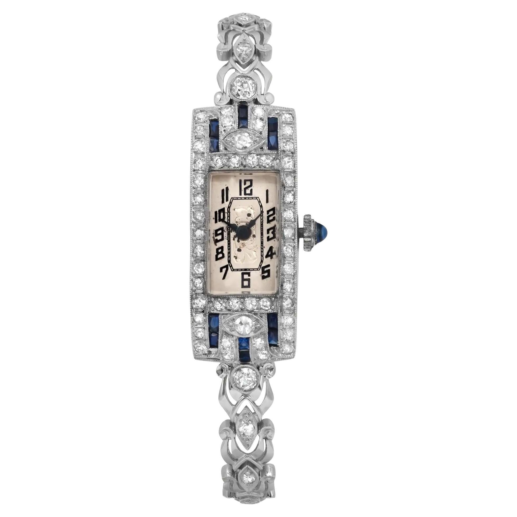 Antiguo Reloj de cuerda manual para señora de oro blanco de 14 quilates, platino, zafiro azul y diamantes en venta