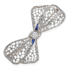 Antique 14k White Gold & Platinum Diamond and Sapphire Filigree Bow Brooch