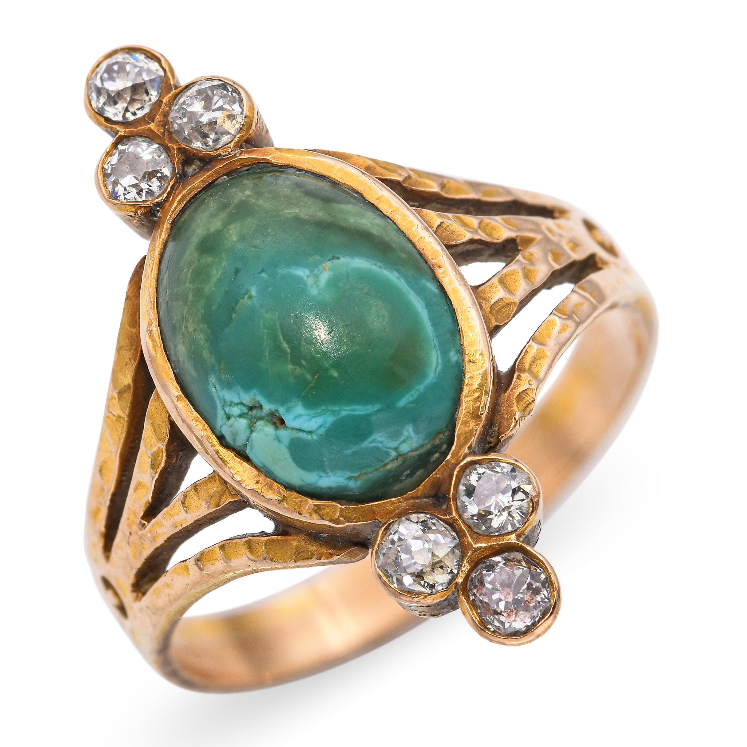 Antique 14k Yellow Gold Chrysocolla and Diamond Hammered Ring, featuring a striking chrysocolla cabochon as the centerpiece. The vivid blue-green tones of the chrysocolla are enhanced by a hammered gold setting, giving the piece an organic,