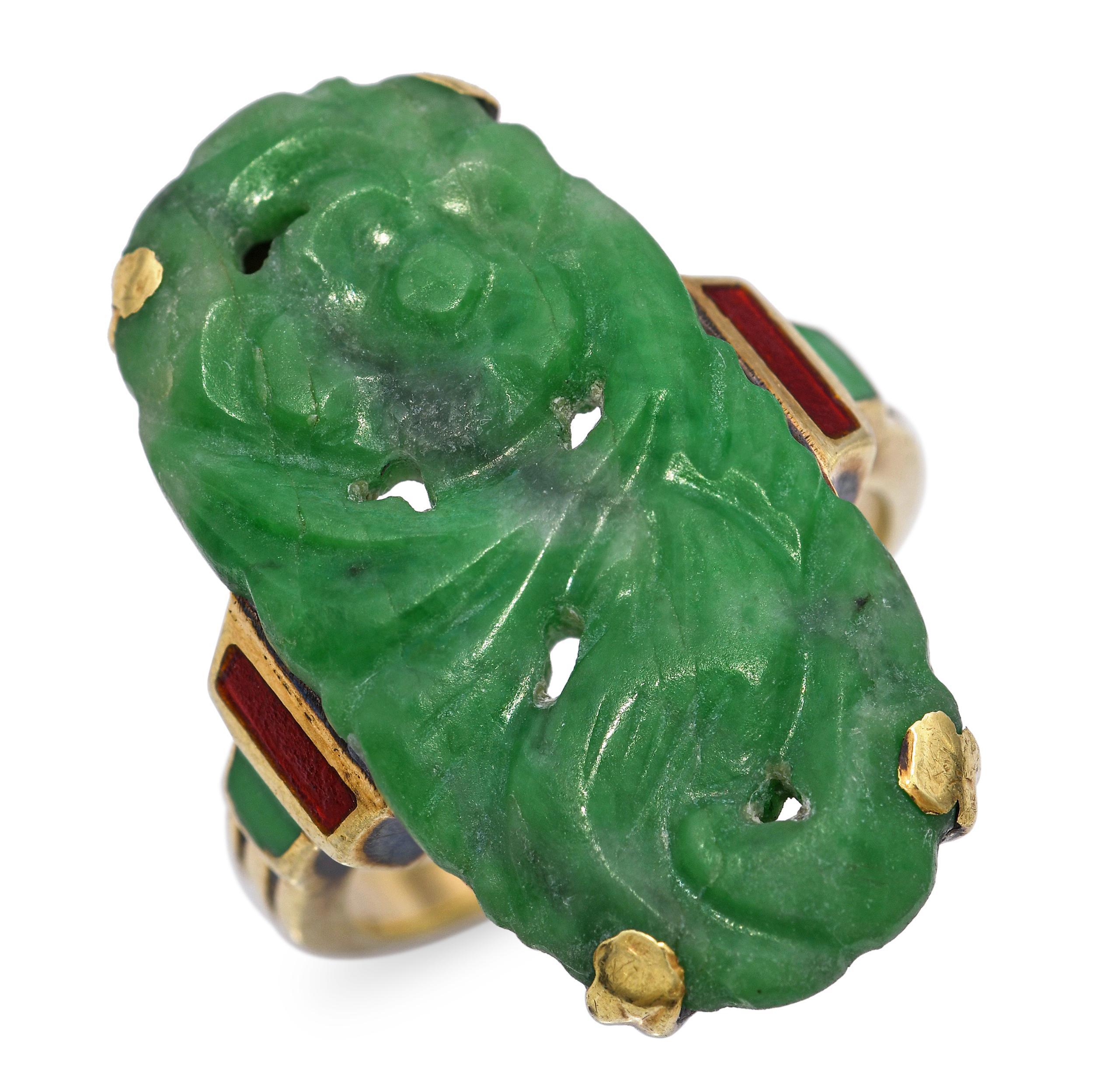 This elegant antique ring is crafted in 14k yellow gold and features a smooth, richly colored jade gemstone as its centerpiece. Delicate enamel accents enhance the design, adding intricate detail and vintage charm. The warm gold setting complements