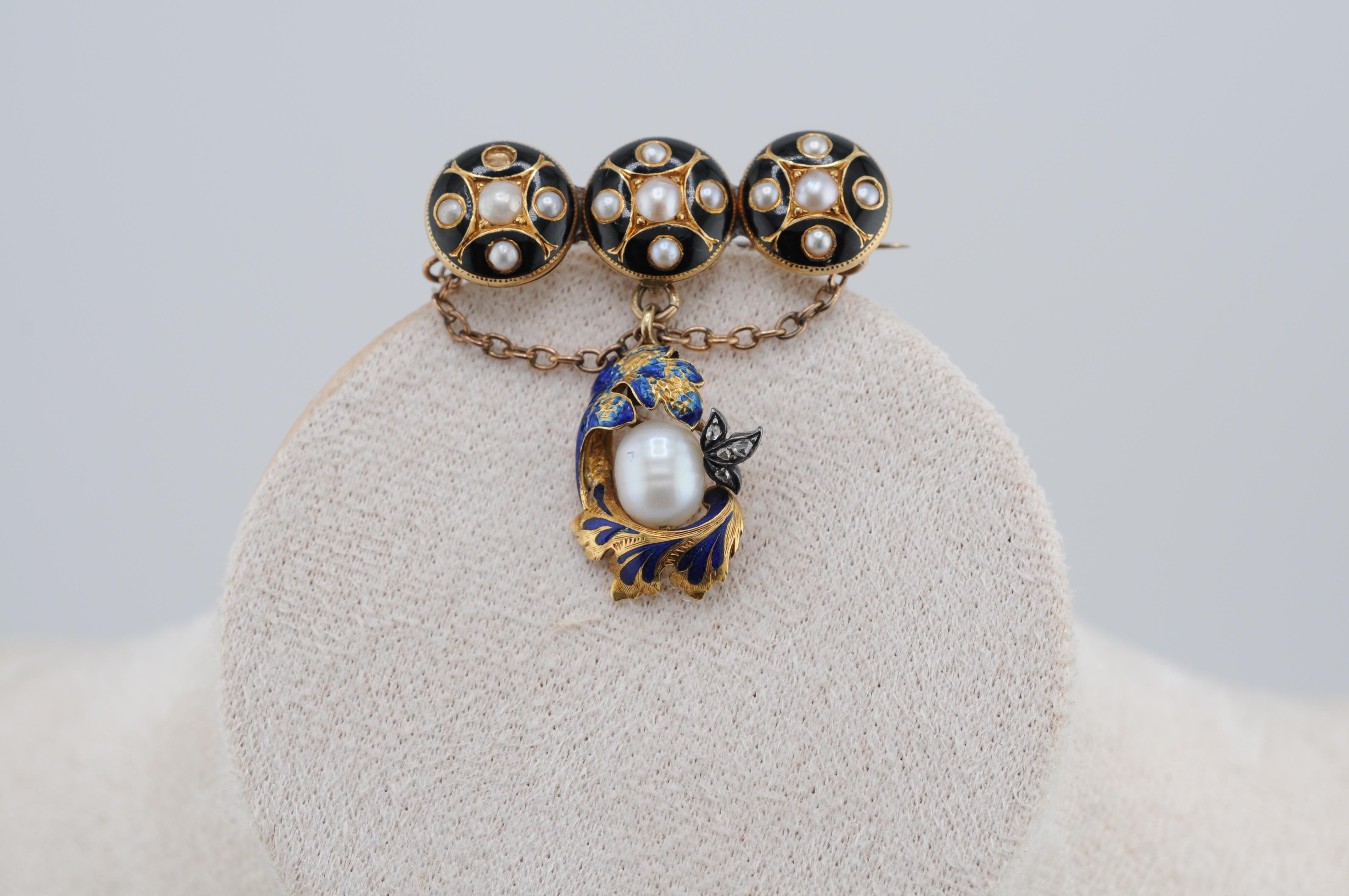 Charming antique brooch from around 1890, finely crafted in 14 karat yellow gold. The piece features delicate enamel detailing and a natural pearl accent, typical of late 19th century craftsmanship. A lovely example of historical elegance with