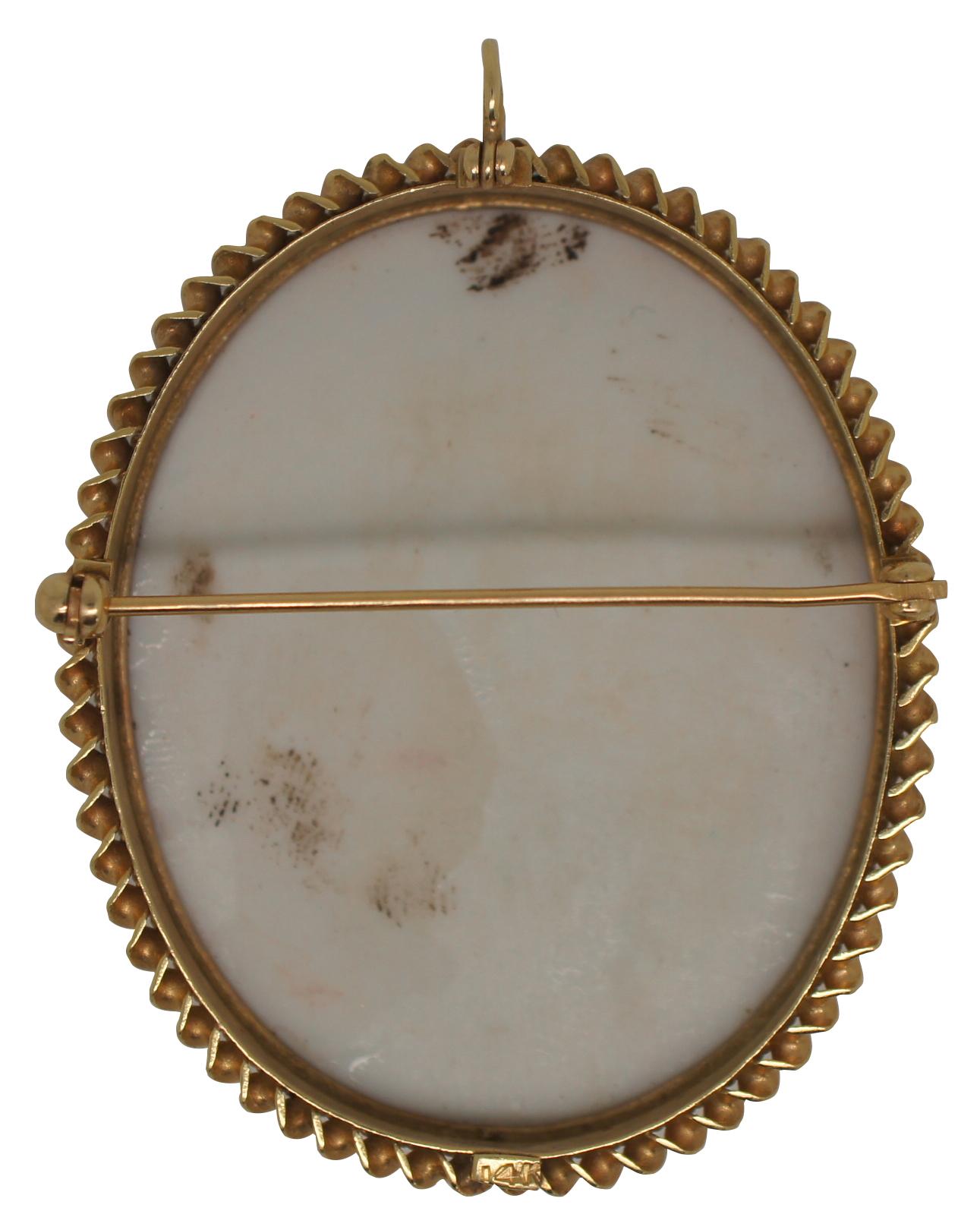 Antique hand painted cameo portrait on porcelain of a woman long brown hair and bare shoulders covering her chest with a white cloth, set in a 14-karat gold rope frame; can be used as a pin/brooch or strung on a chain as a pendant.

Weight - 14