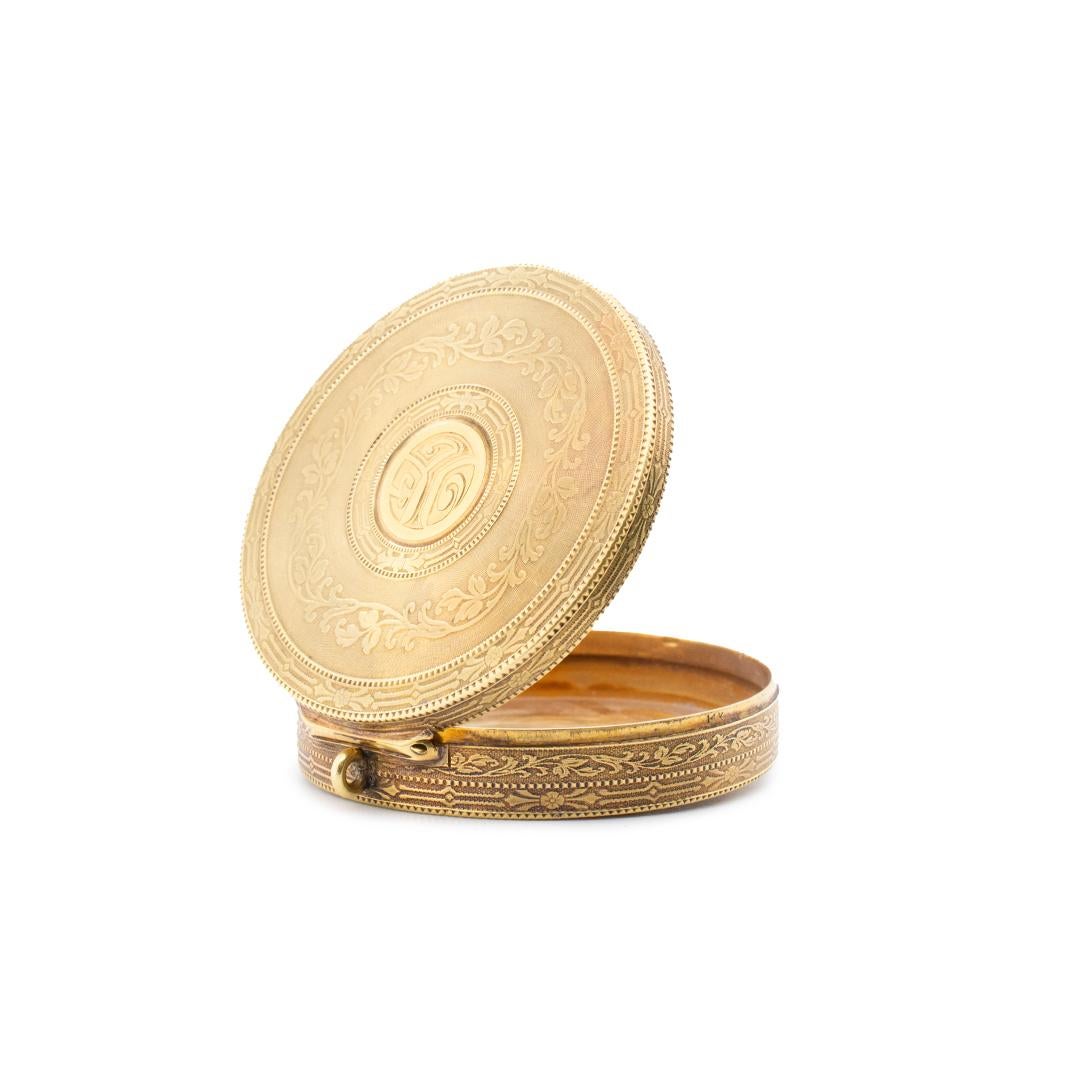 One lady's hand made 14K yellow gold polished and textured, antique makeup box. The makeup box is 11.20mm thick and measures approximately 2.00 inches in length by 2.00 inches in width and weighs a total of 31.50 grams. In excellent condition.

SKU: