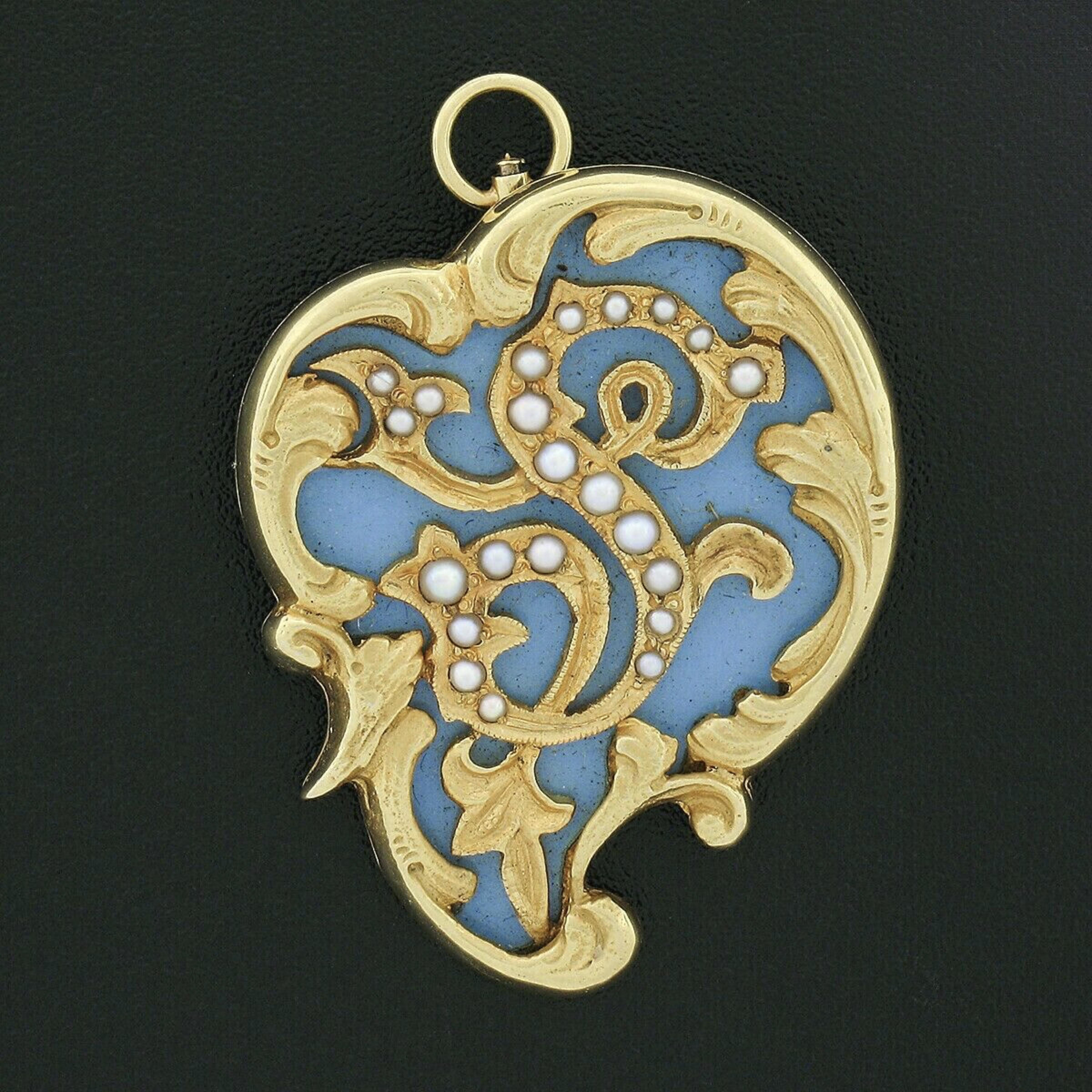 Here we have an antique brooch or pendant that was crafted in the 1910's from solid 14k yellow gold. This incredible piece features a fine turquoise that is inlaid set, showing a beautiful blue color. The stone acts as the perfect background to the