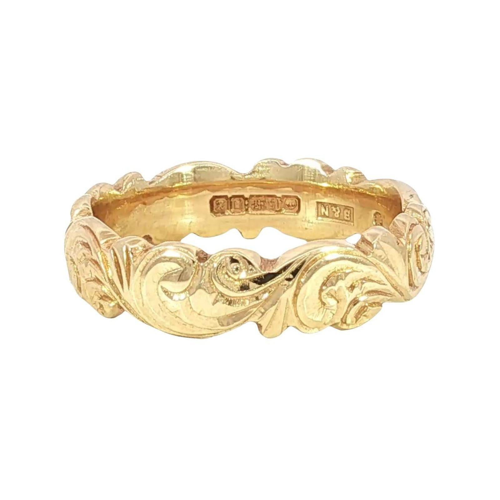 Antike 14k Gelbgold Scroll Arbeit graviert Band Ring Größe 6,25

Dieser exquisite Ring zeichnet sich durch eine aufwendige Gravur aus, die ein strukturiertes und verziertes Design schafft, das sich nahtlos um das Band legt. Der Ring ist aus