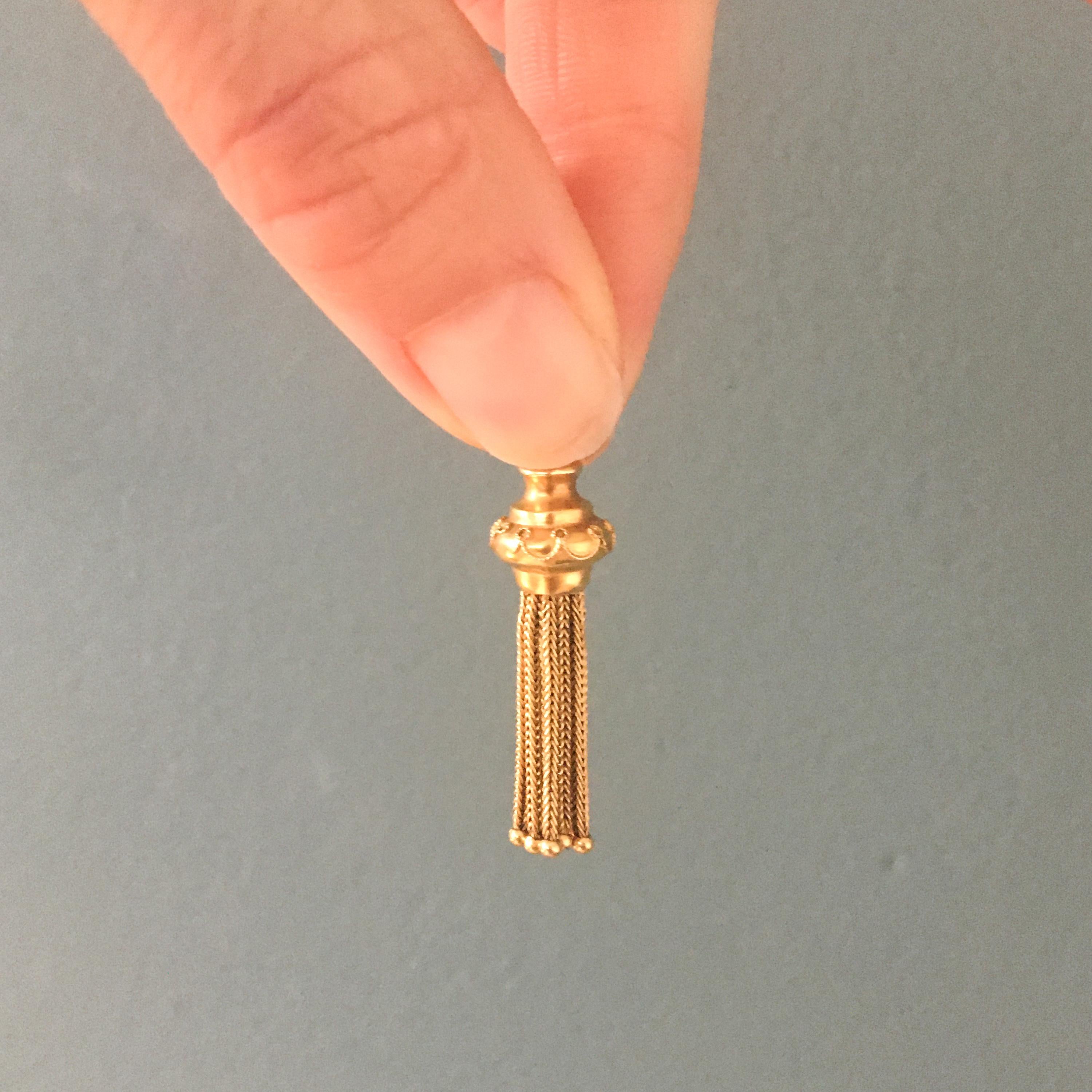 gold tassel pendant