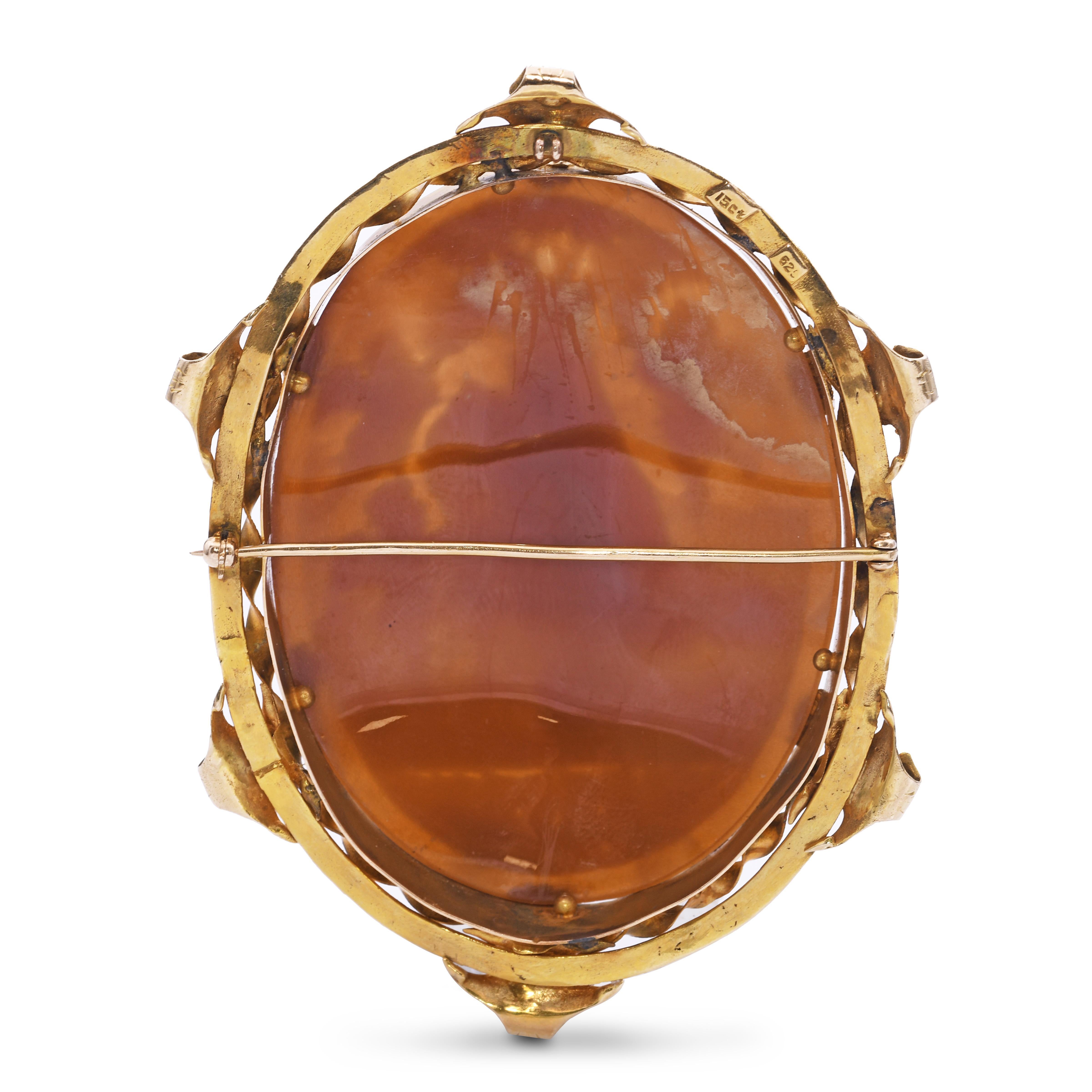 This exquisite antique shell cameo features a classical scene of Venus surrounded by playful cherubs, intricately hand-carved in natural shell. Set in a 14k yellow gold frame, the brooch showcases the romantic elegance and mythological charm of