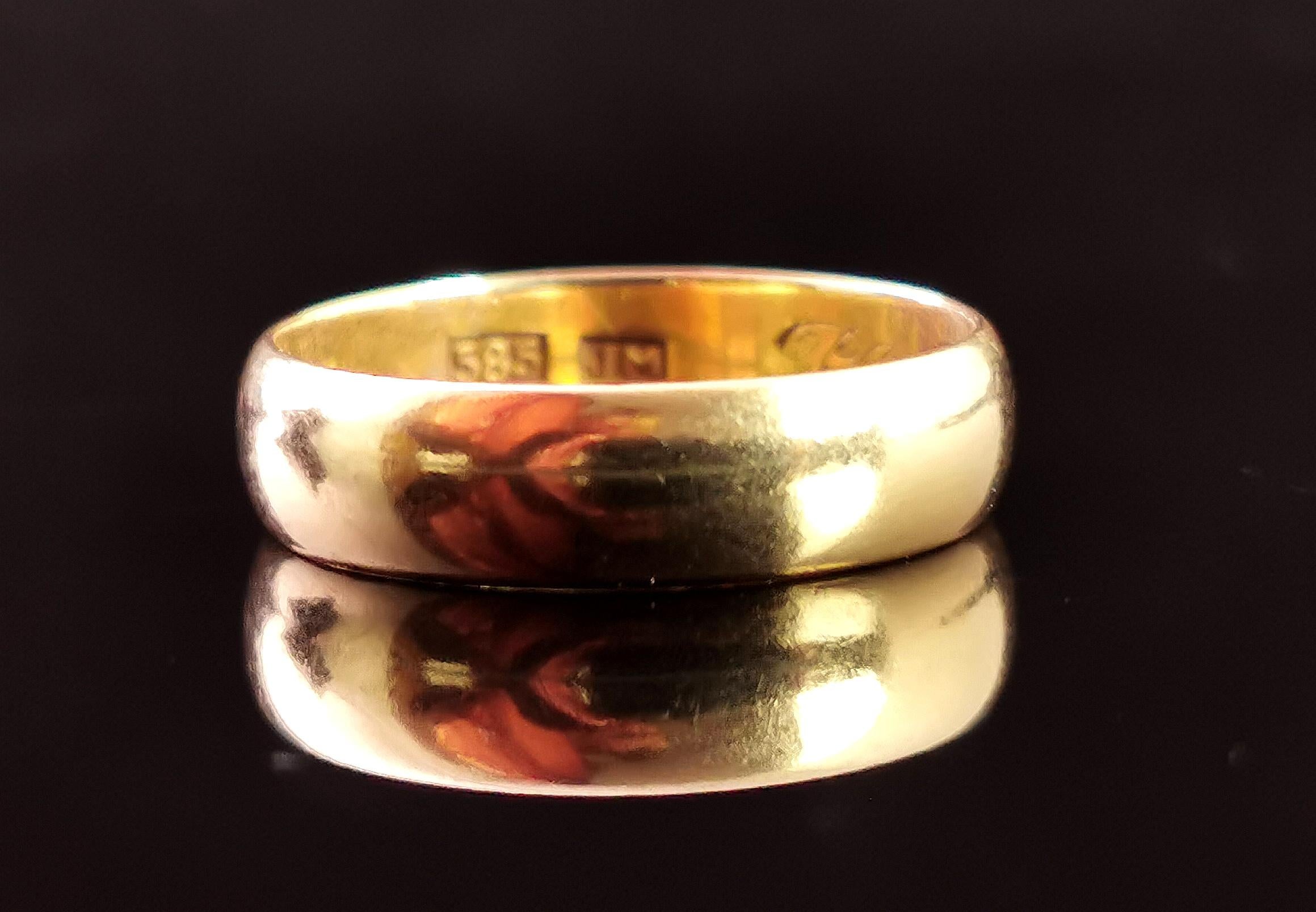 A gorgeous, early 1910s era 14ct gold band ring or wedding ring.

Rich, warm, golden 14ct yellow gold, this lovely hue is only ever found on antique gold.

It has a soft D profile and it has a good weight to it, the band is approximately 5.2mm width