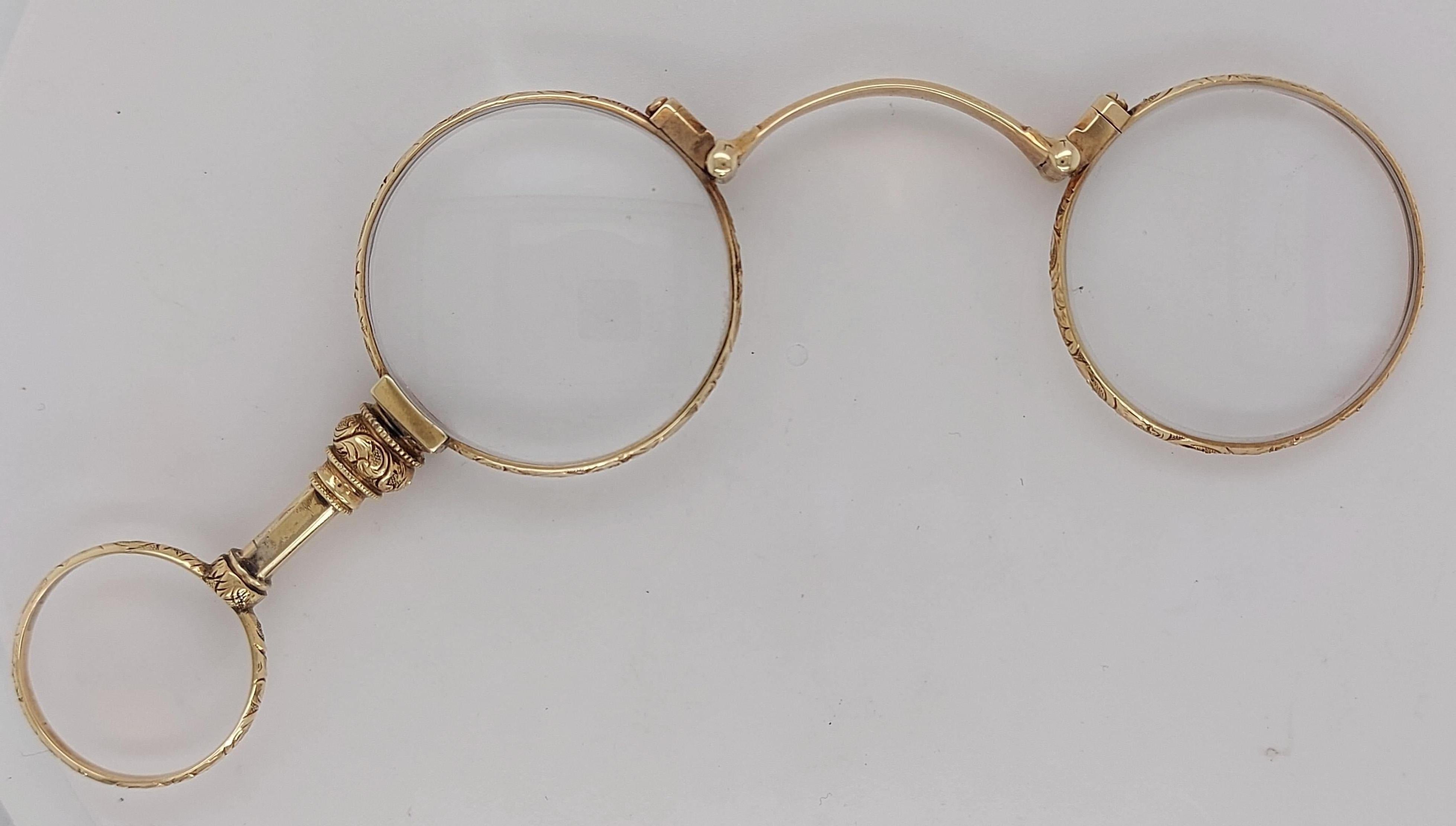 Old - World Style Antique 14kt Yellow Gold Lorgnette Handle Opera Glasses

A real collector item

Material: 14kt Yellow Gold

Total weight: 27.6 gram / 0.975 oz / 17.7 dwt

Measurements: 34 mm x 77 mm, Glass diameter: 33 mm