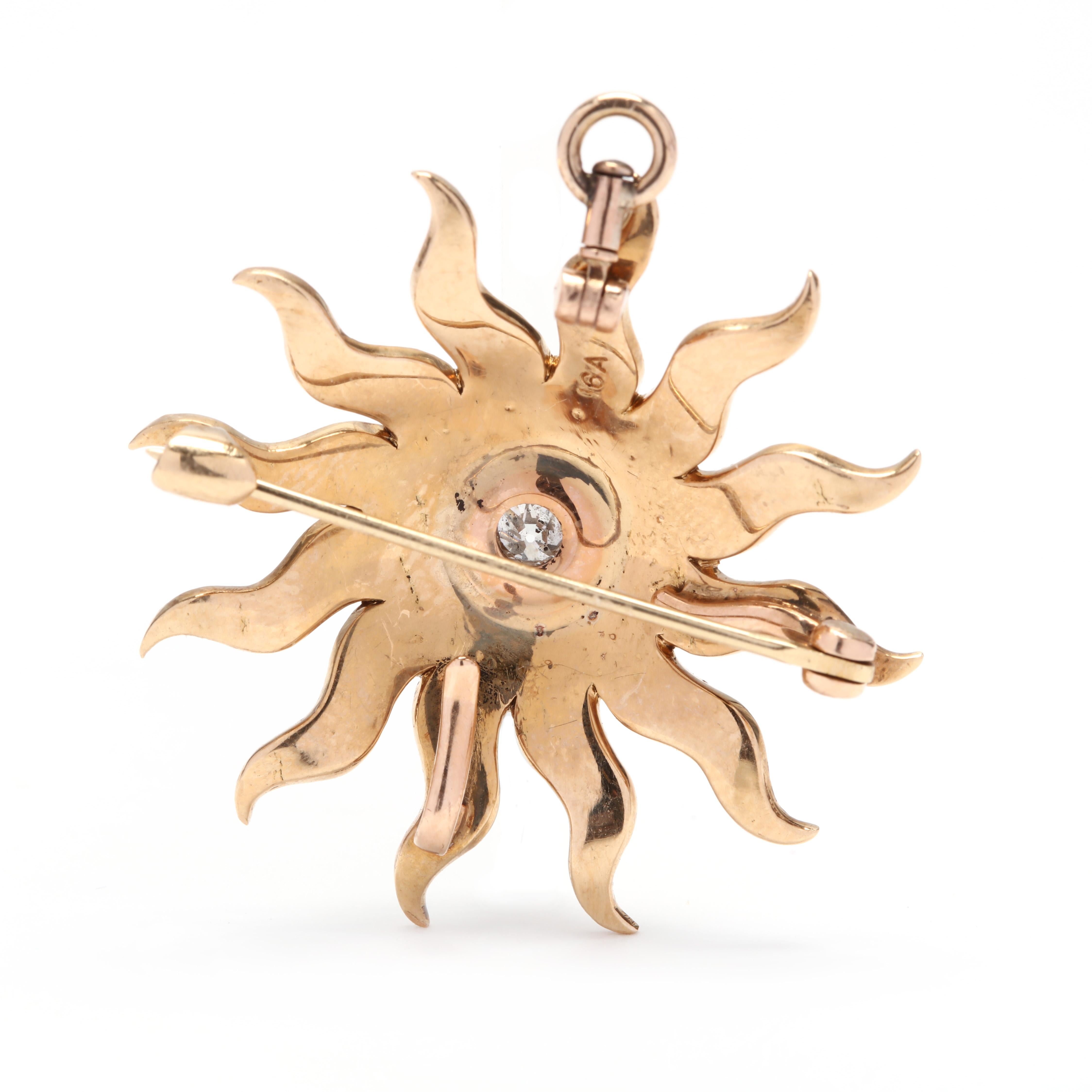 An antique 14 karat yellow gold diamond and seed pearl sunburst pendant and brooch. This pendant features an old European cut diamond centerstone weighing approximately .17 carat surrounded by round cbaochon seed pearls set in a sunburst motif with