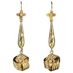Antique 15 Carat Gold Victorian Gold Drop Lovers Knot Pearl Earrings, circa 1880