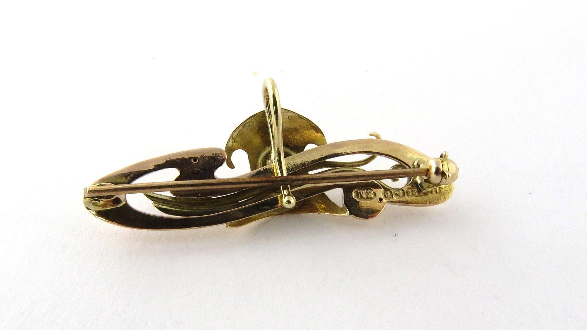 Antique 15K Yellow Gold Georgian Diamond Swirl Pin Brooch with Chatalaine Hook. 

Side swept tendrils under a prong set diamond makes this piece a beautiful brooch or pendant. 

English hallmarks read: 625, anchor, e. Marker: F.M. Dated 1802 Assayed