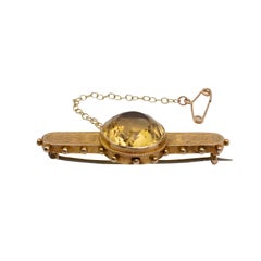 Antique 15 Karat Gold Citrine Brooch With Engraved Celtic Knot Detail