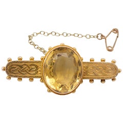 Antique 15 Karat Gold Citrine Brooch With Engraved Celtic Knot Detail