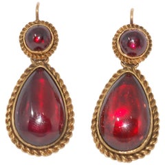 Antique 15 Karat Gold Rope Edged Cabochon Garnet Pendant Earrings, circa 1875