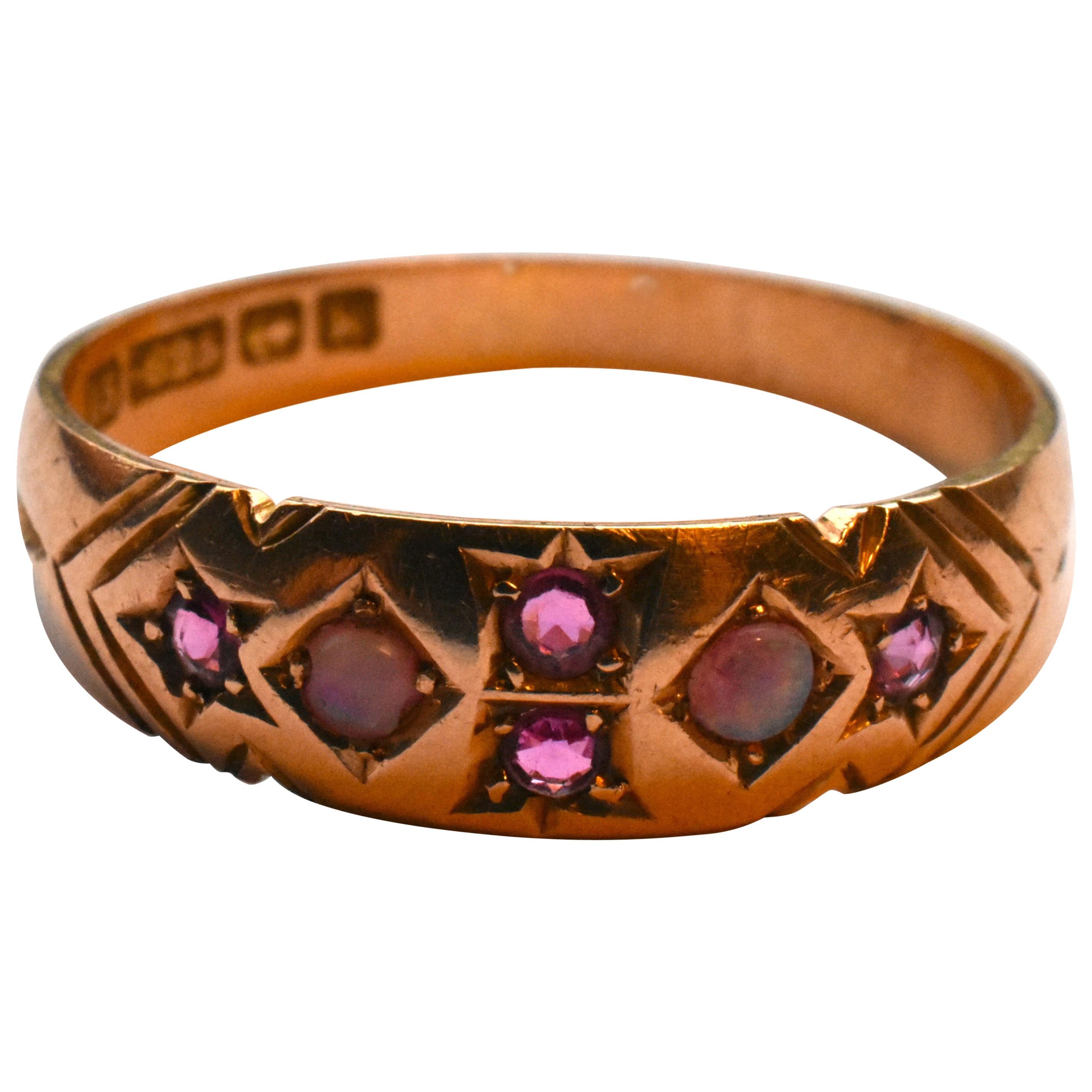 Antique 15 Karat Gypsy Ring with Rubies and Opals