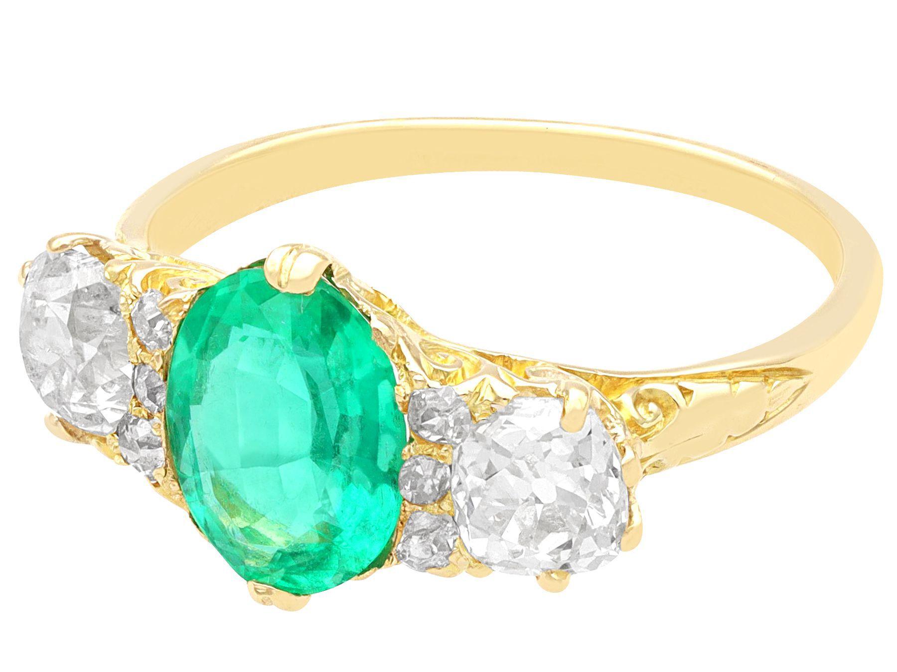 Women's or Men's Antique 1.50 Carat Emerald and 2.64 Carat Diamond Yellow Gold Ring For Sale