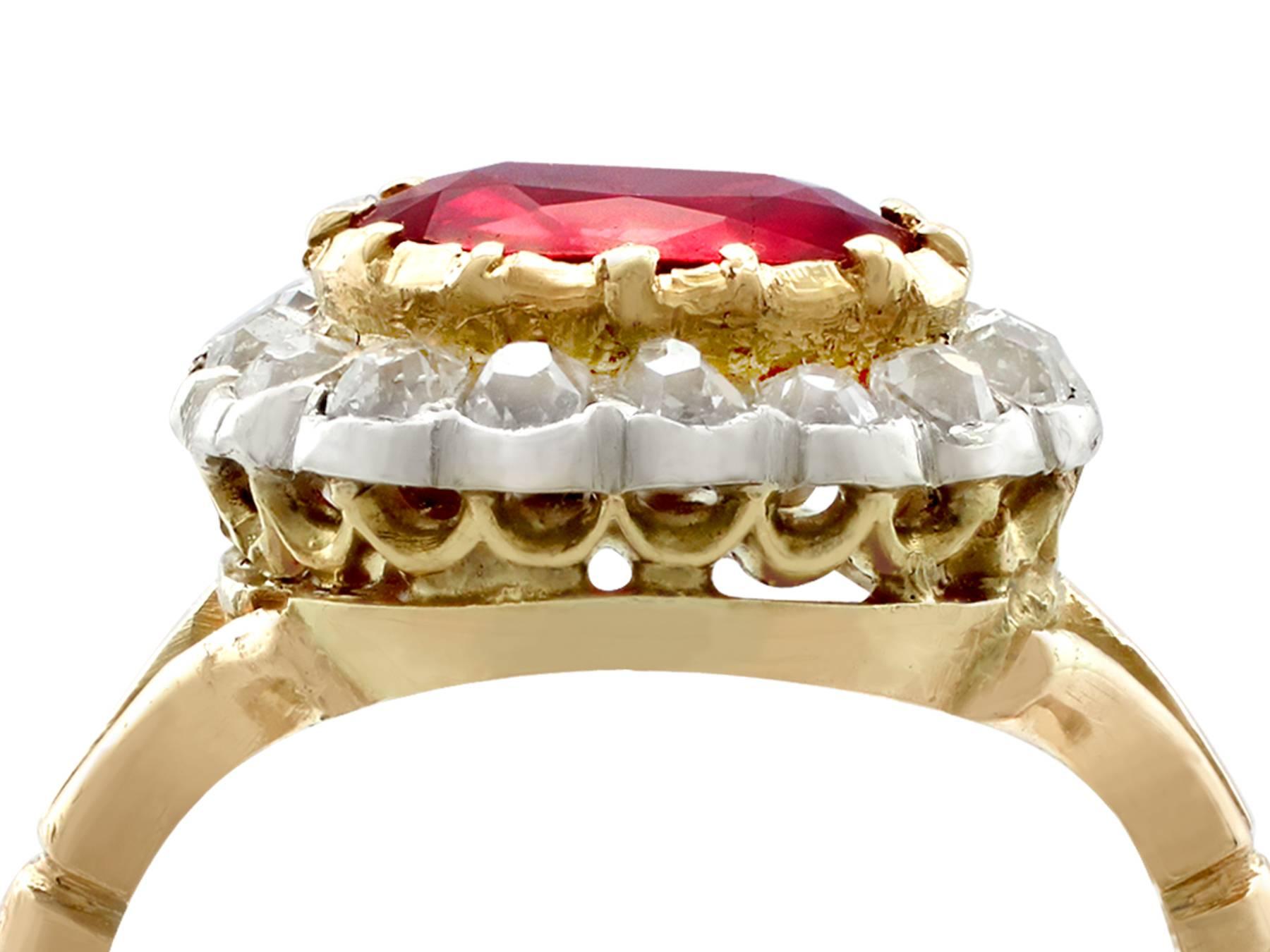 A stunning, fine and impressive antique 1.50 carat ruby and 0.60 carat diamond, 18 karat yellow gold, 18 karat white gold set cluster ring; part of our antique jewelry and estate jewelry collections

This stunning, fine and impressive antique ruby