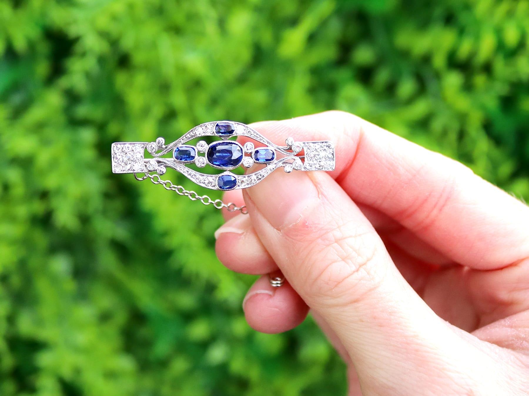 A fine and impressive antique 1.50 carat sapphire and 0.60 carat diamond, platinum brooch; part of our diverse antique Edwardian jewelry collection.

This fine and impressive antique brooch has been crafted in platinum.

The pierced decorated bar