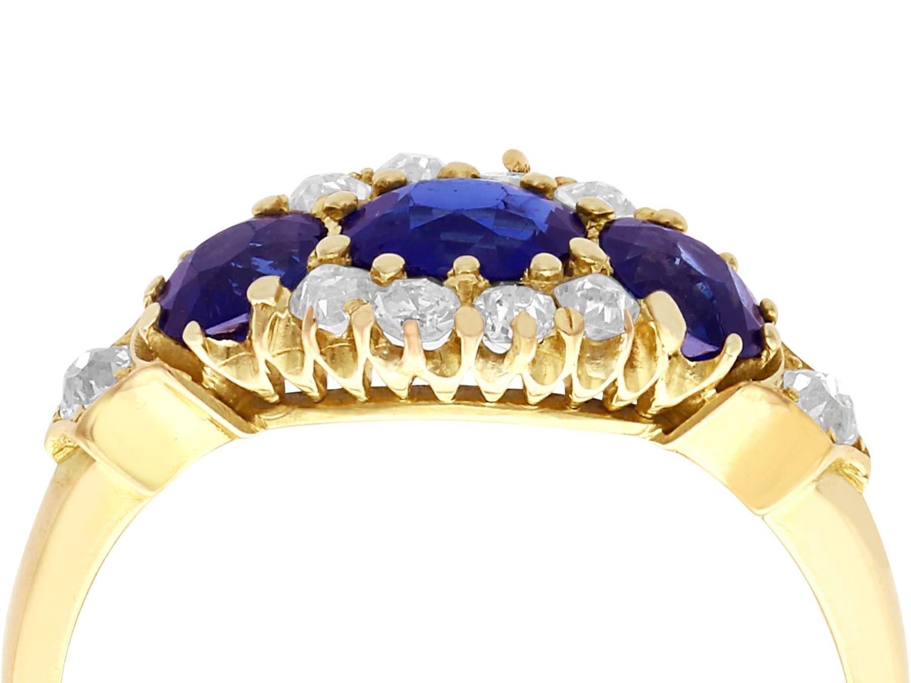 An impressive antique 1.50 carat sapphire and 0.35 carat diamond, 18 karat yellow gold cocktail ring; part of our diverse antique jewelry and estate jewelry collections.

This fine and impressive antique sapphire and diamond ring has been crafted in