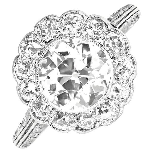Bague ancienne en platine avec diamant taille européenne ancienne de 1,52 carat, halo de diamants, c. 1910