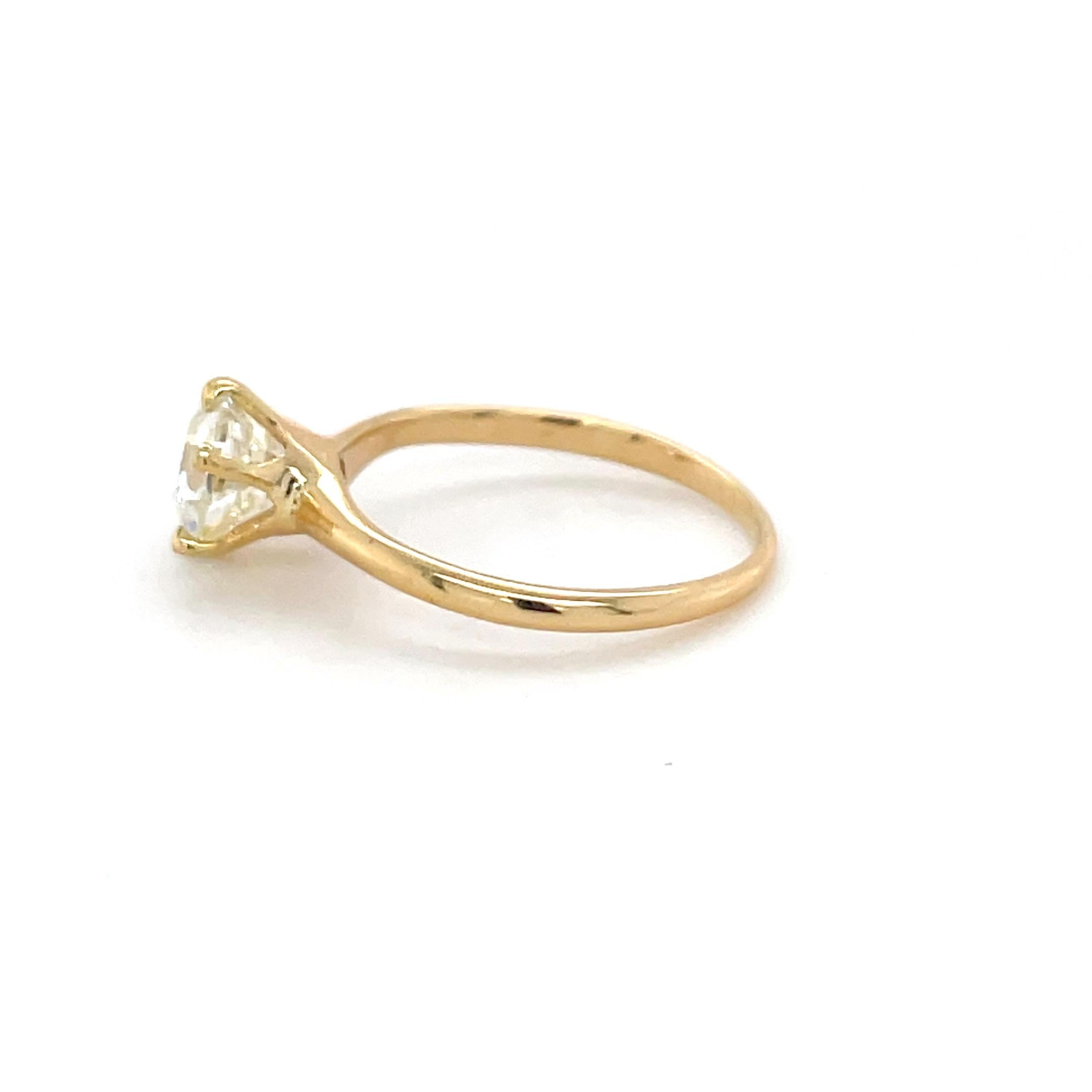 This late Victorian diamond engagement ring boasts a beautiful 1.55 carat old European cut diamond. Mounted within six claw prongs, this ring is elegant with a touch of history.

Ring Size: 6 1/4
Metal: 14 karat yellow gold
Gross weight: 1.68