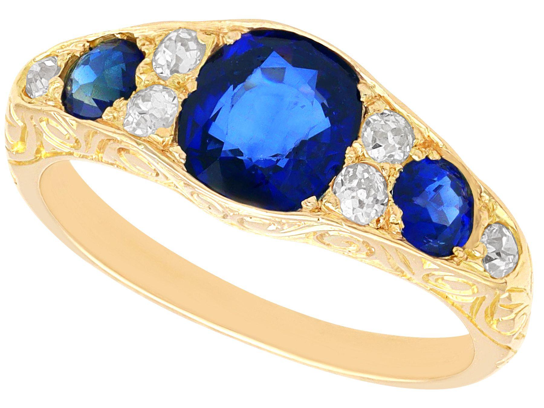 A stunning, fine and impressive antique 1.55 karat sapphire and 0.20 karat diamond, 18 karat yellow gold dress ring; part of our diverse diamond jewelry and estate jewelry collections.

This stunning, fine and impressive sapphire and diamond ring