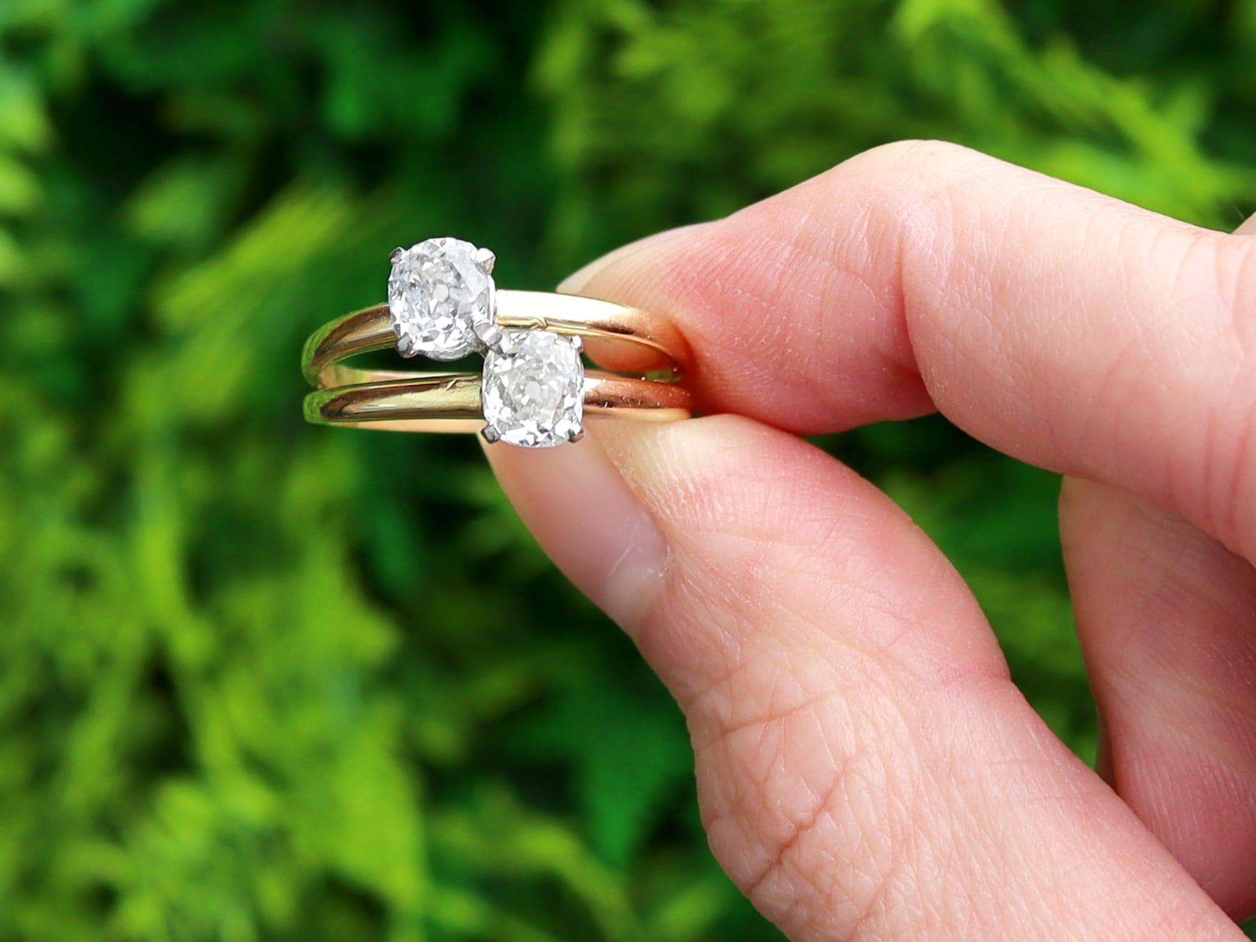 A stunning, fine and impressive, unusual antique 1.55 carat diamond, 18 karat yellow gold and platinum set two stone ring; part of our diverse collection of antique 1920s diamond rings.

This fine and impressive antique two stone diamond engagement