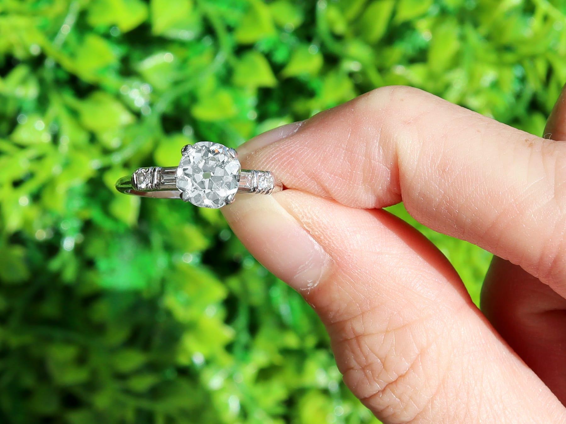 A stunning, fine and impressive antique 1.55 carat diamond and platinum solitaire engagement ring; part of our antique engagement ring collections.

This stunning, fine and impressive diamond solitaire ring has been crafted in platinum.

The pierced