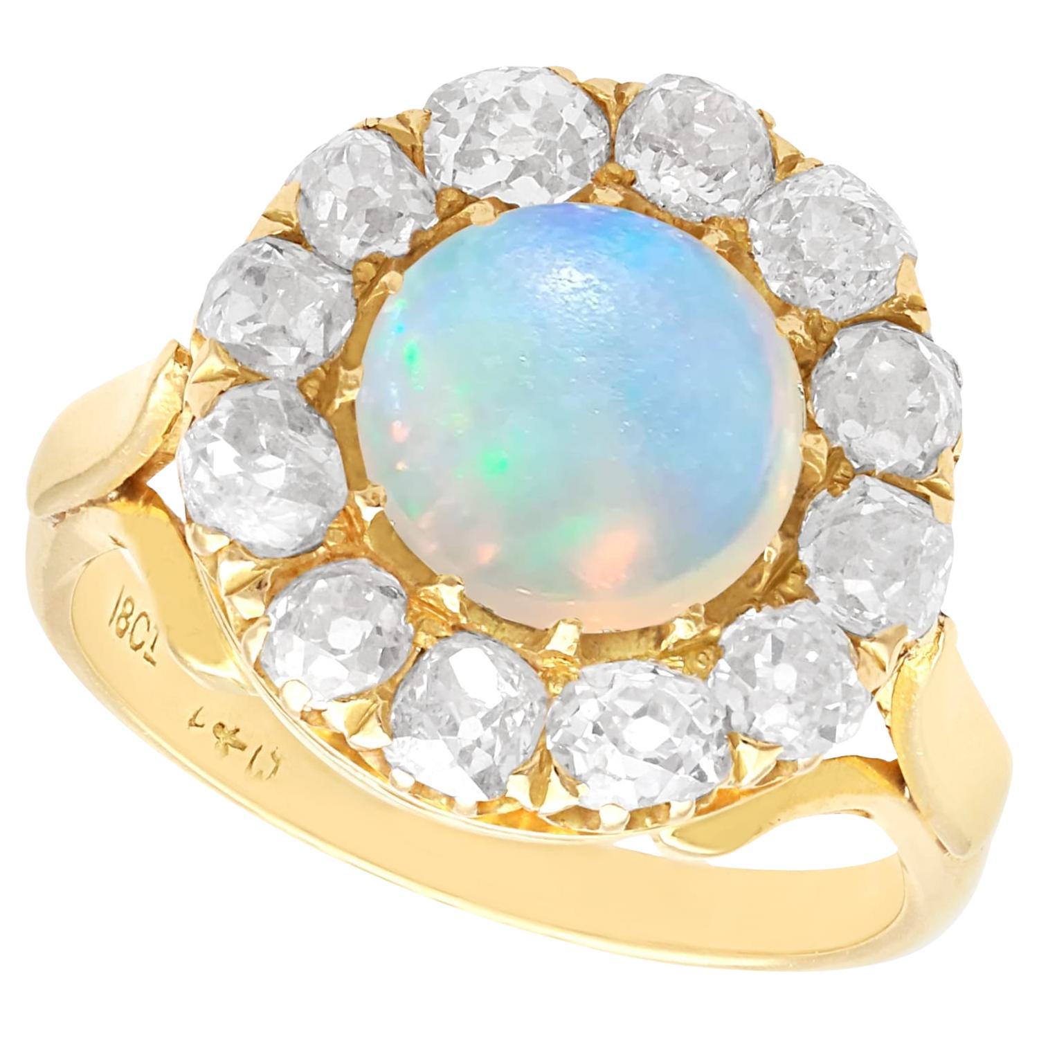 Antique 1.56 Carat Opal and 2.10 Carat Diamond 18k Yellow Gold Dress Ring  For Sale