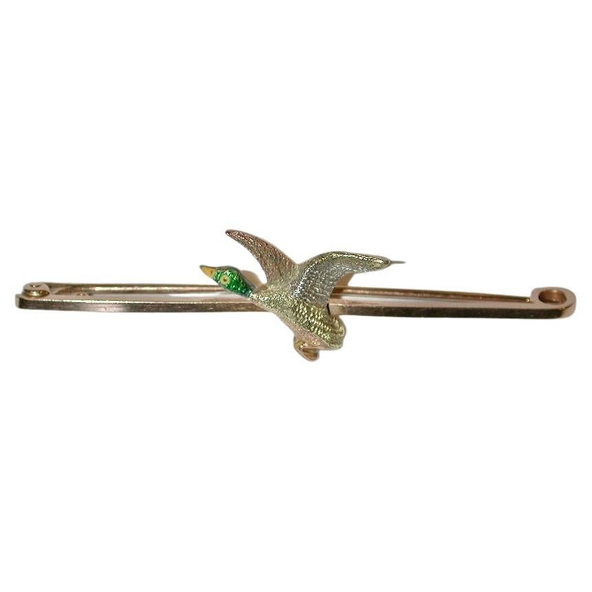 Antique 15ct  2 Colour Gold & Platinum Flying Duck Brooch, Dated Circa 1920
Beautifully made with fine texturing on the body and with an enamel head
The quality is superb with fantastic attention to detail.
