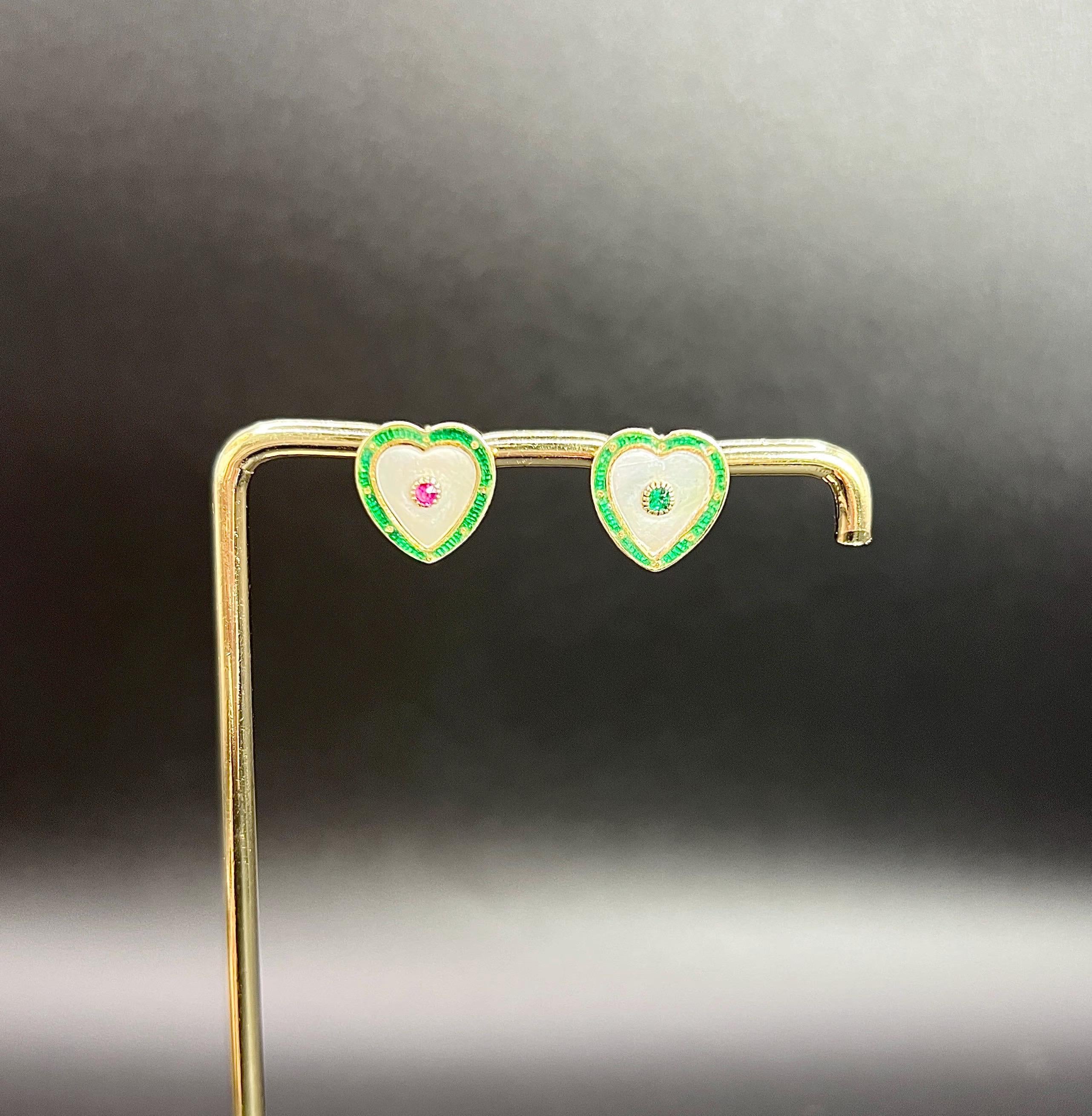 Antique Gold Earrings

15ct Gold Tested

Circa 1920s

Step back in time with this exquisite pair of heart-shaped earrings, crafted in 15ct yellow gold and dating back to the enchanting 1920s. Each earring features a stunning central gemstone: one is