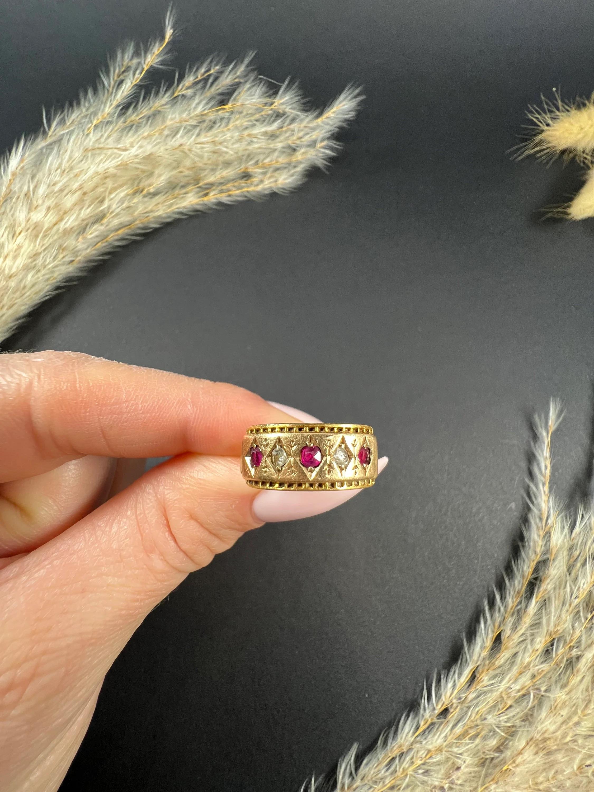 Antique Ring

15ct Gold Stamped

Hallmarked Birmingham 1879

Makers Mark H & S

This 15ct gold ring is a true beauty and features alternating natural rubies and diamonds elegantly set in pretty diamond-shaped settings. The ring is set in yellow gold