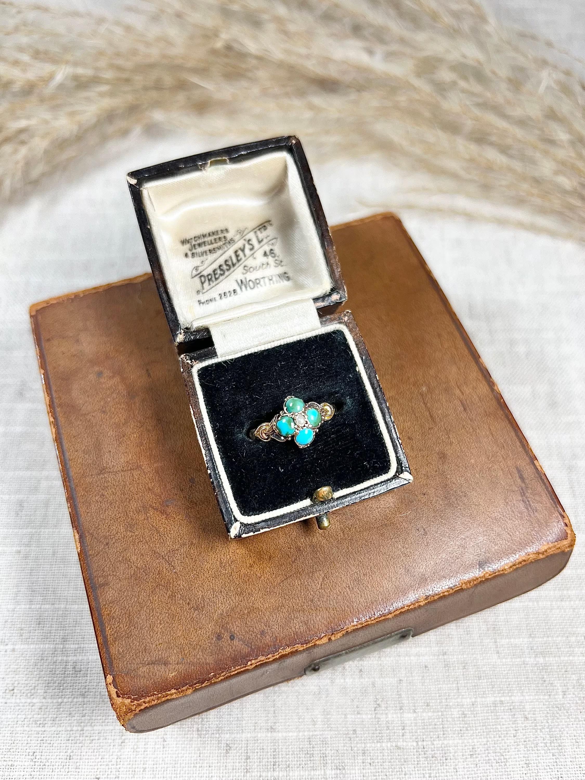 Antique Turquoise Ring 

15ct Gold Stamped 

Hallmarked Birmingham 1866

Makers Mark B G 

Here's a lovely early Victorian gold ring that would make a great addition to any collection! It features four round turquoise stones and a centre seed pearl,