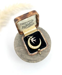 Antique 15ct Gold, Edwardian Pearl Crescent Moon Pendant with Rose Gold Swallow