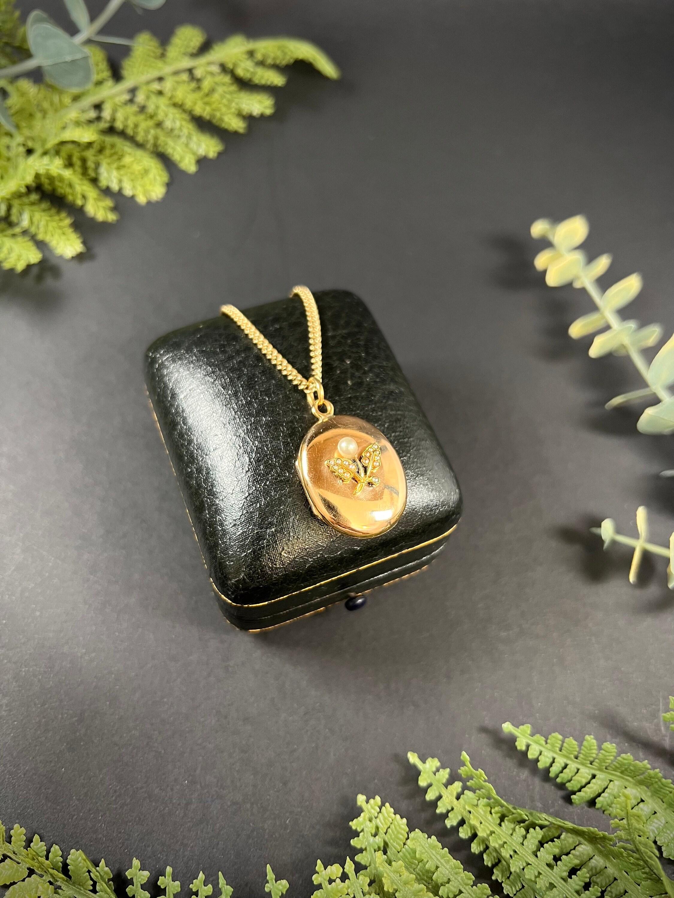 Antique médaillon ovale édouardien en or 15 carats avec fleurs de perles en vente 2
