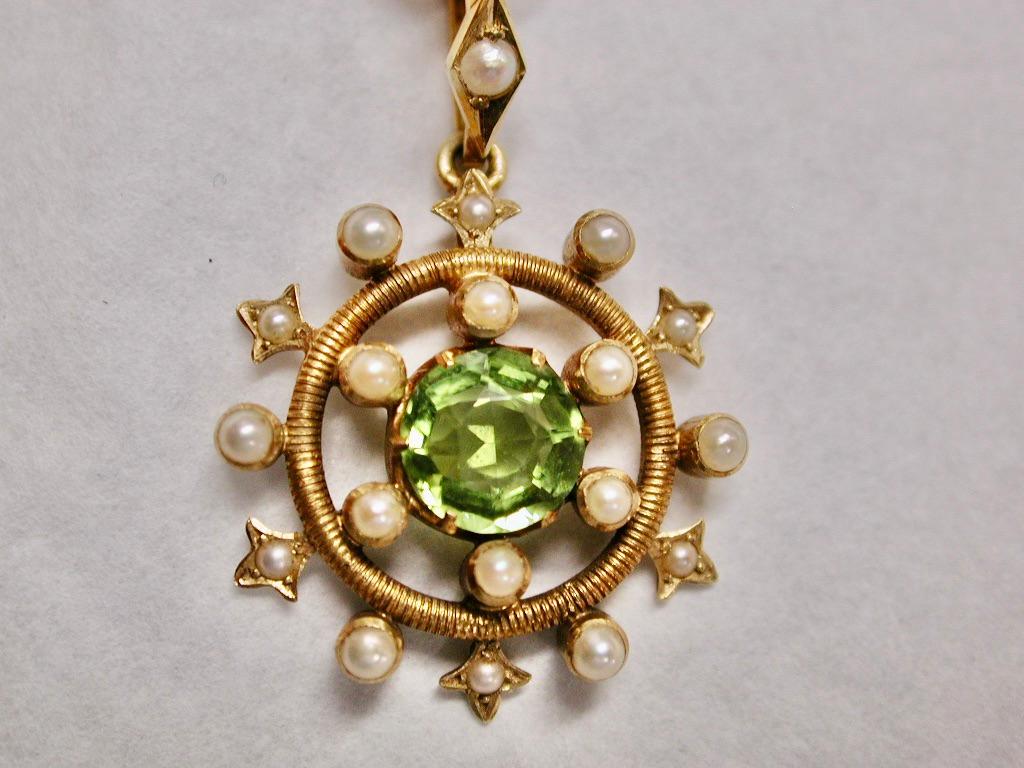 Antique 15ct Gold Peridot & Pearl Pendant on Antique 9ct Gold Chain Dated Circa 1900
Beautiful Pendant set with real peridot and real seed pearls.
The chain has a ribbed belcher pattern
