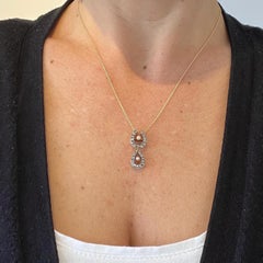 Collier ancien en or 15 carats et argent, avec double fer à cheval porte-bonheur, diamants et perles