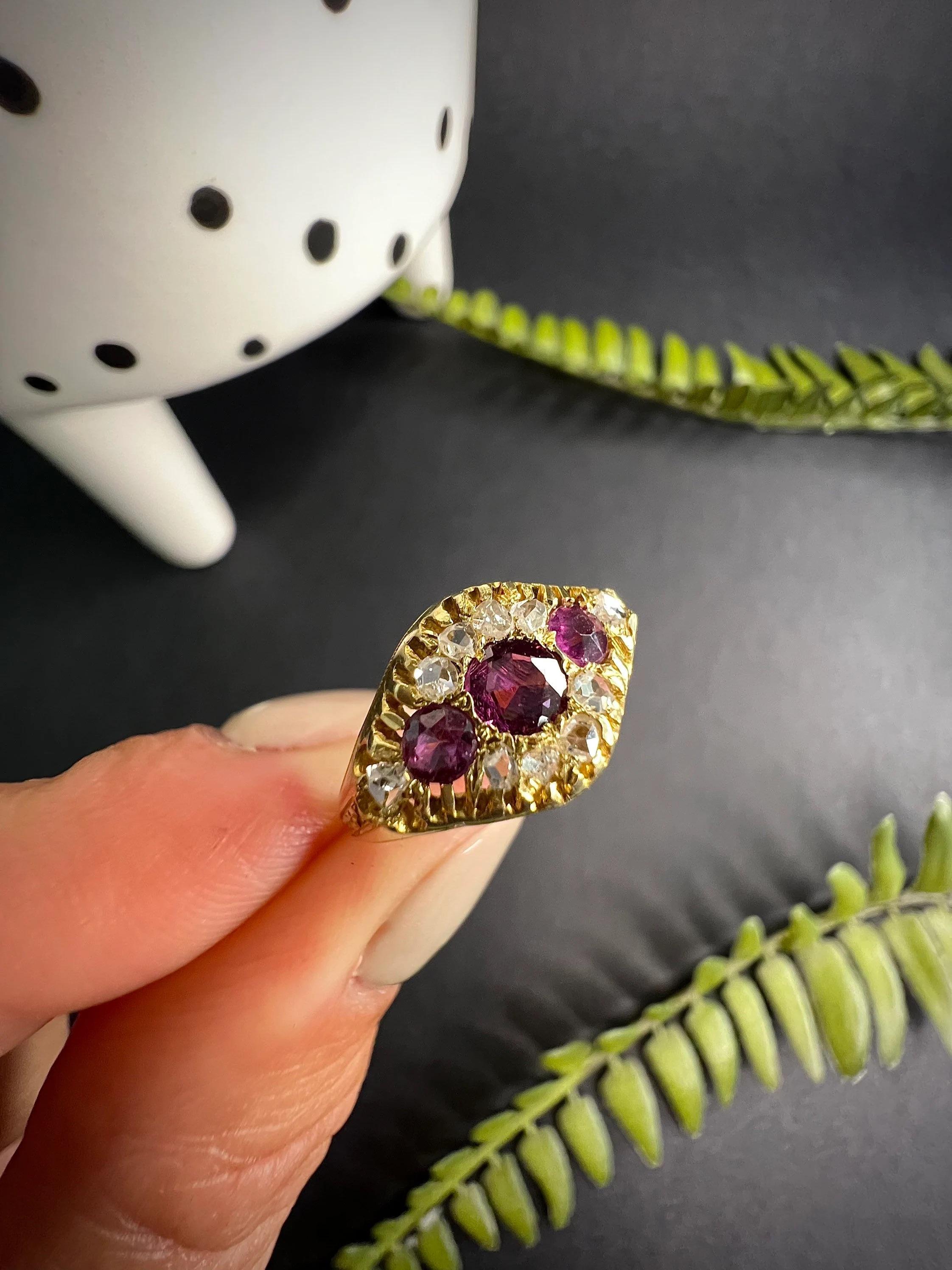 Antique Almandine Garnet Ring 

15ct Gold 

Hallmarked Birmingham 1899

Absolutely Stunning, Victorian Ring. Set with Gorgeous Almandine Garnets & Diamonds. 
The Detailing is Just Fabulous, From The Cage Work to The Intricate Patterned Shoulders &